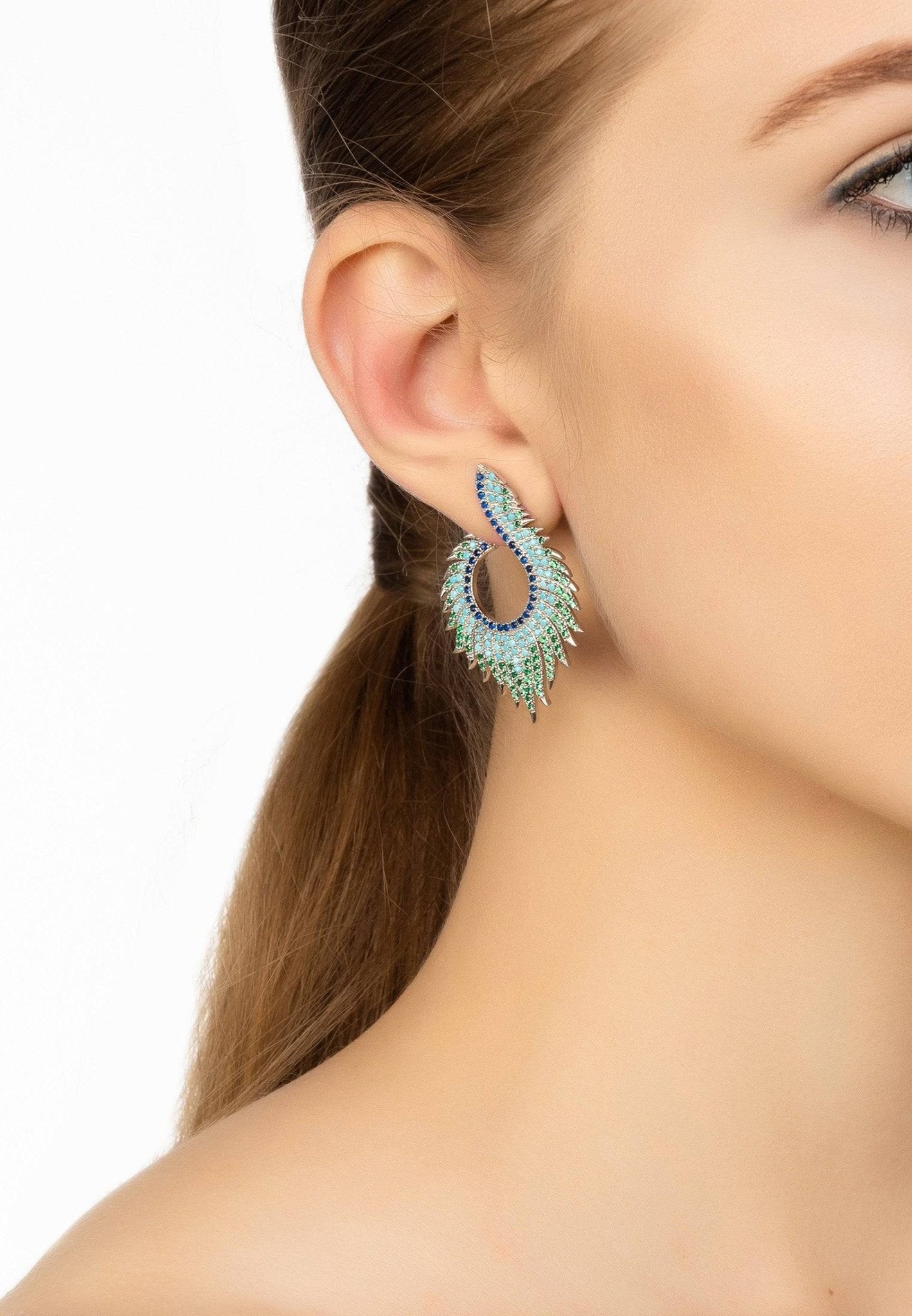 Elegant Flame Earrings Cold Ice Silver with blue and green zirconia, crafted from 925 sterling silver, showcasing a flame-inspired design.