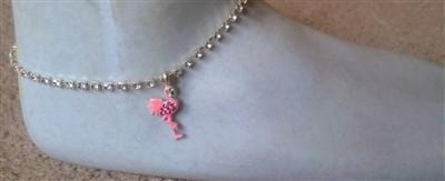 A stylish pink flamingo crystal anklet featuring sparkling crystals and a secure clasp closure, perfect for beachwear.