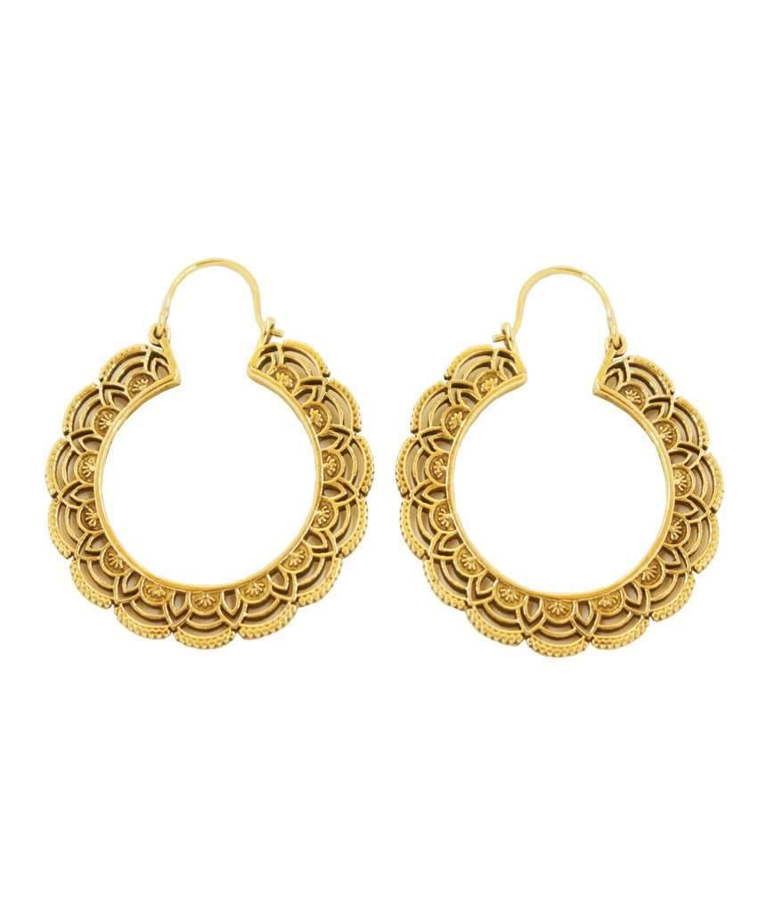 A pair of elegant floral hoop earrings featuring intricate etched designs, crafted from brass and silver-plated brass.