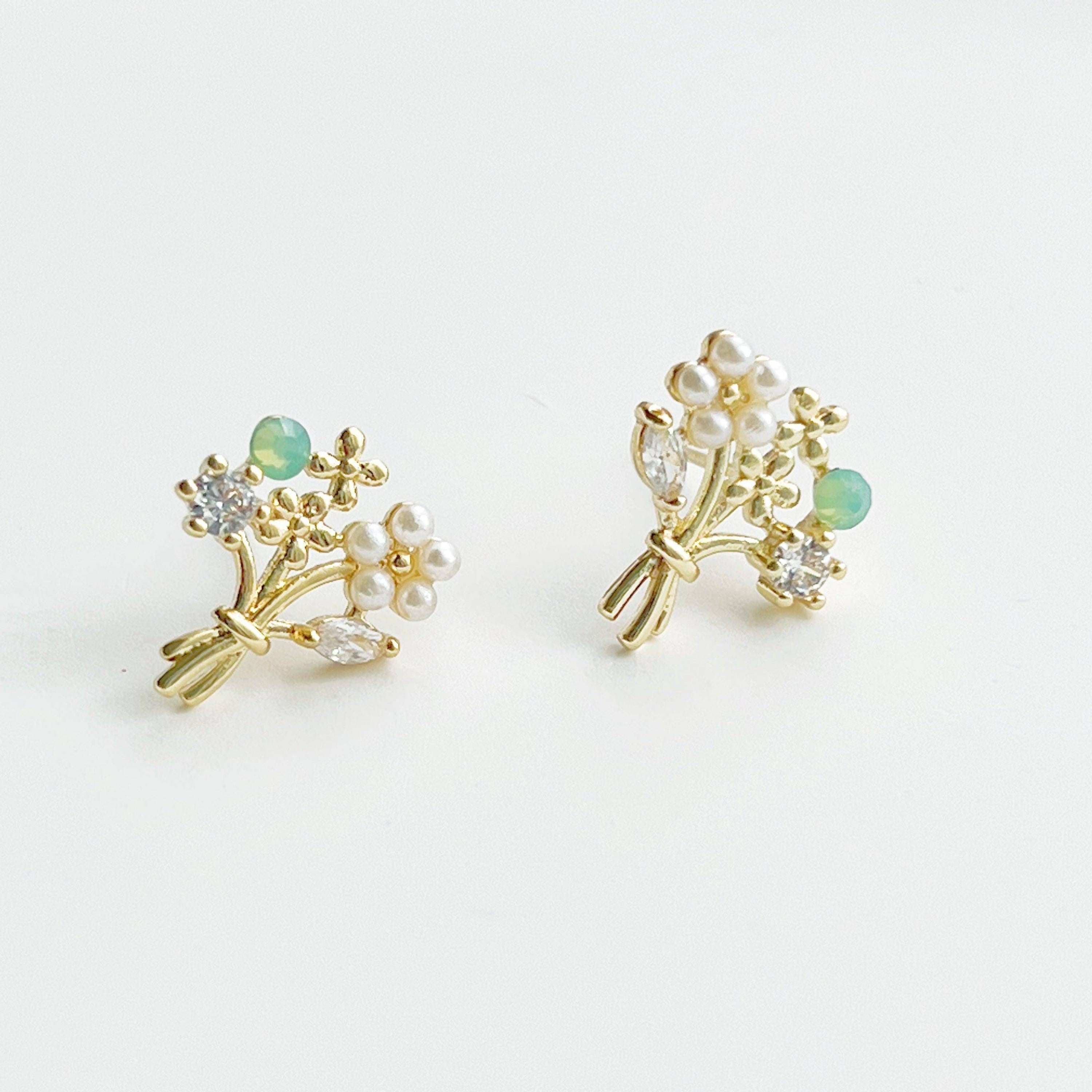 Elegant Flower Bouquet Earrings featuring gold flowers and green crystal studs, beautifully designed for celebrations.