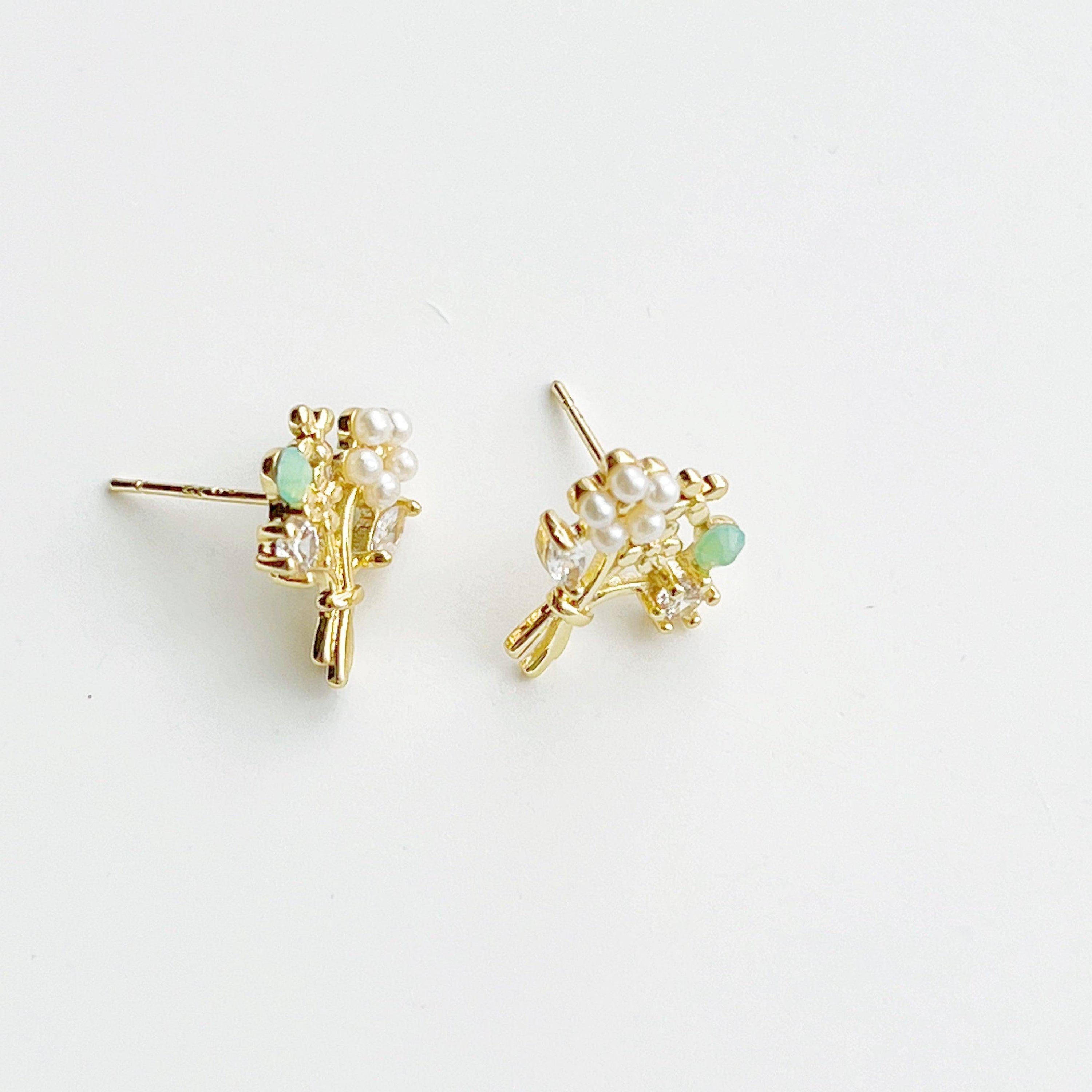 Elegant Flower Bouquet Earrings featuring gold flowers and green crystal studs, beautifully designed for celebrations.