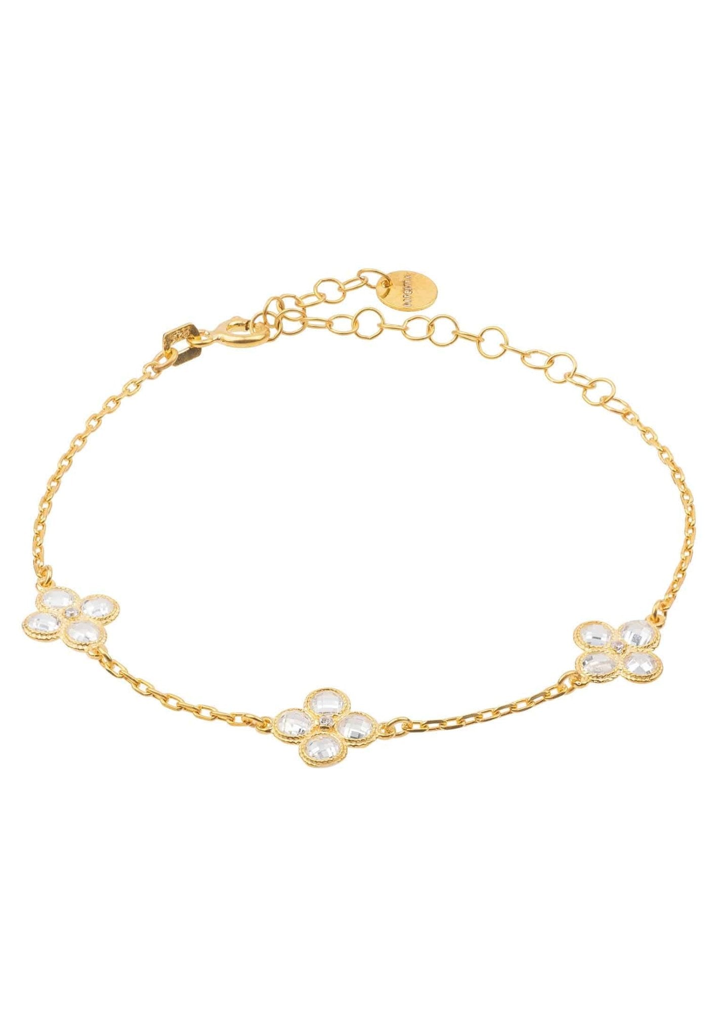 Flower Clover Triple Bracelet in gold with three floral motifs and white zirconia, showcasing a delicate chain and adjustable length.