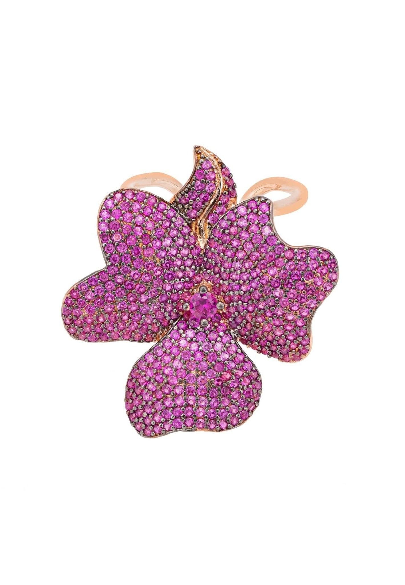 Flower Cocktail Ring in Rosegold featuring a large flower motif adorned with ruby cubic zirconia on adjustable metallic bands.