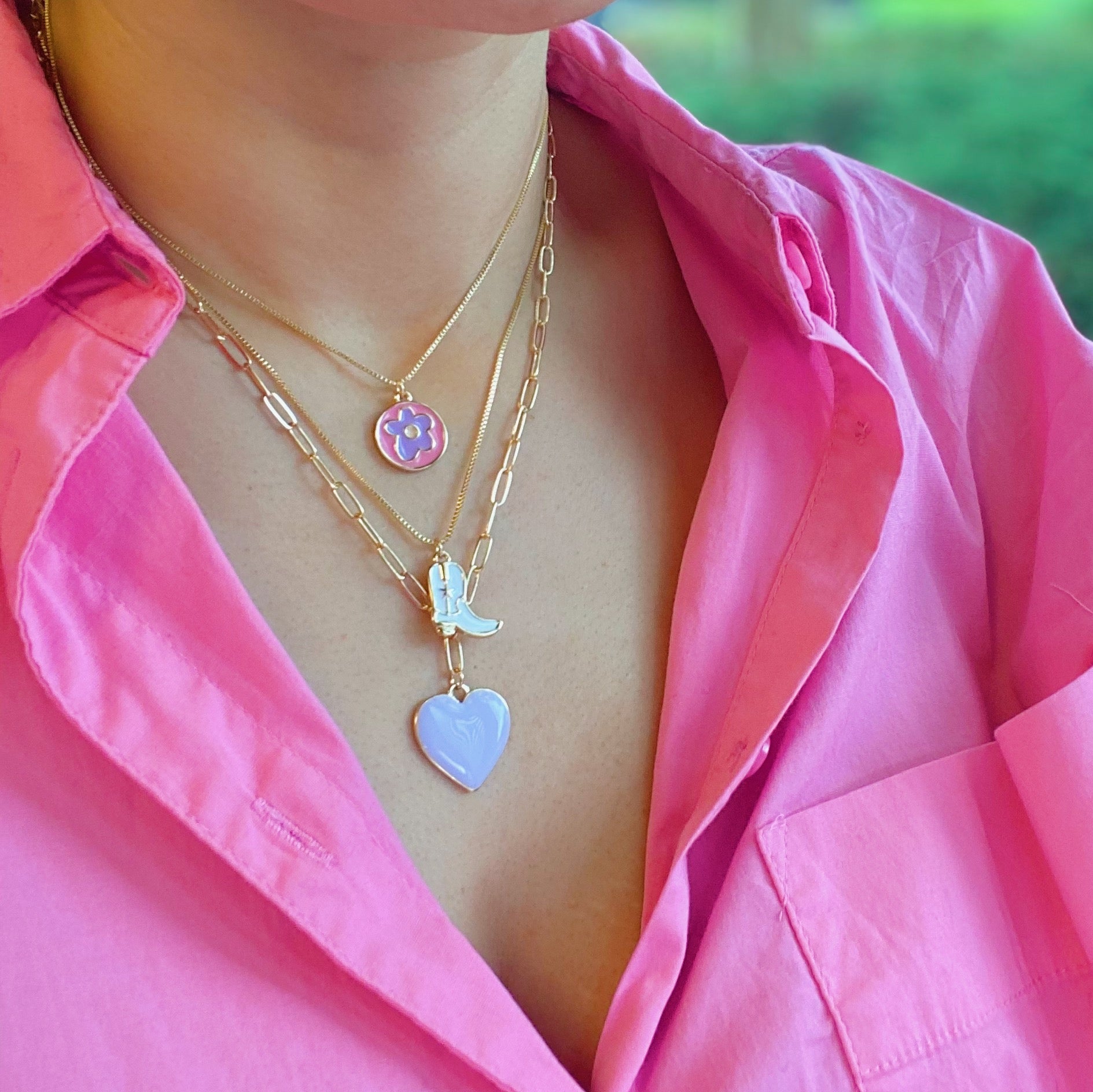 A delicate Flower Lover Necklace featuring a colorful flower pendant on a gold plated chain.