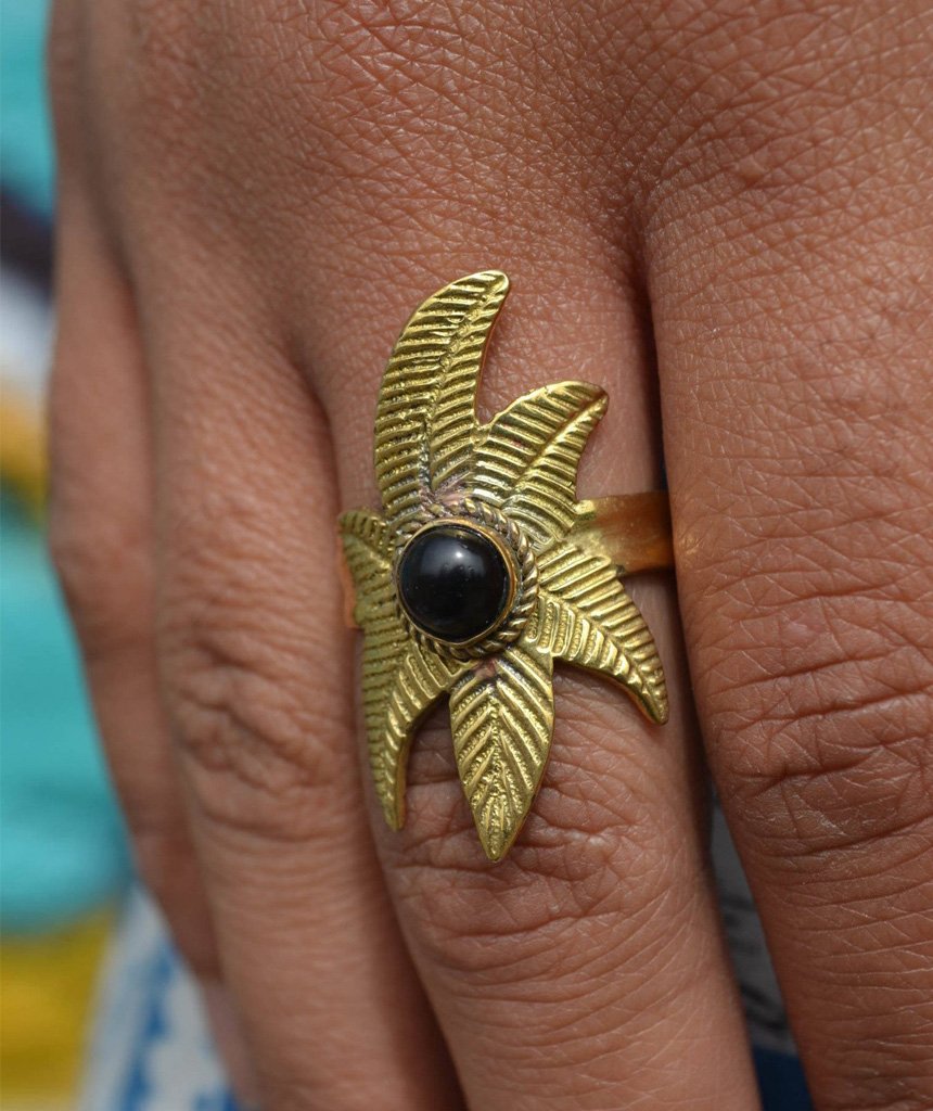 A beautiful Flower Ring featuring a unique floral design, crafted from hypoallergenic brass and silver, perfect for festivals and everyday wear.