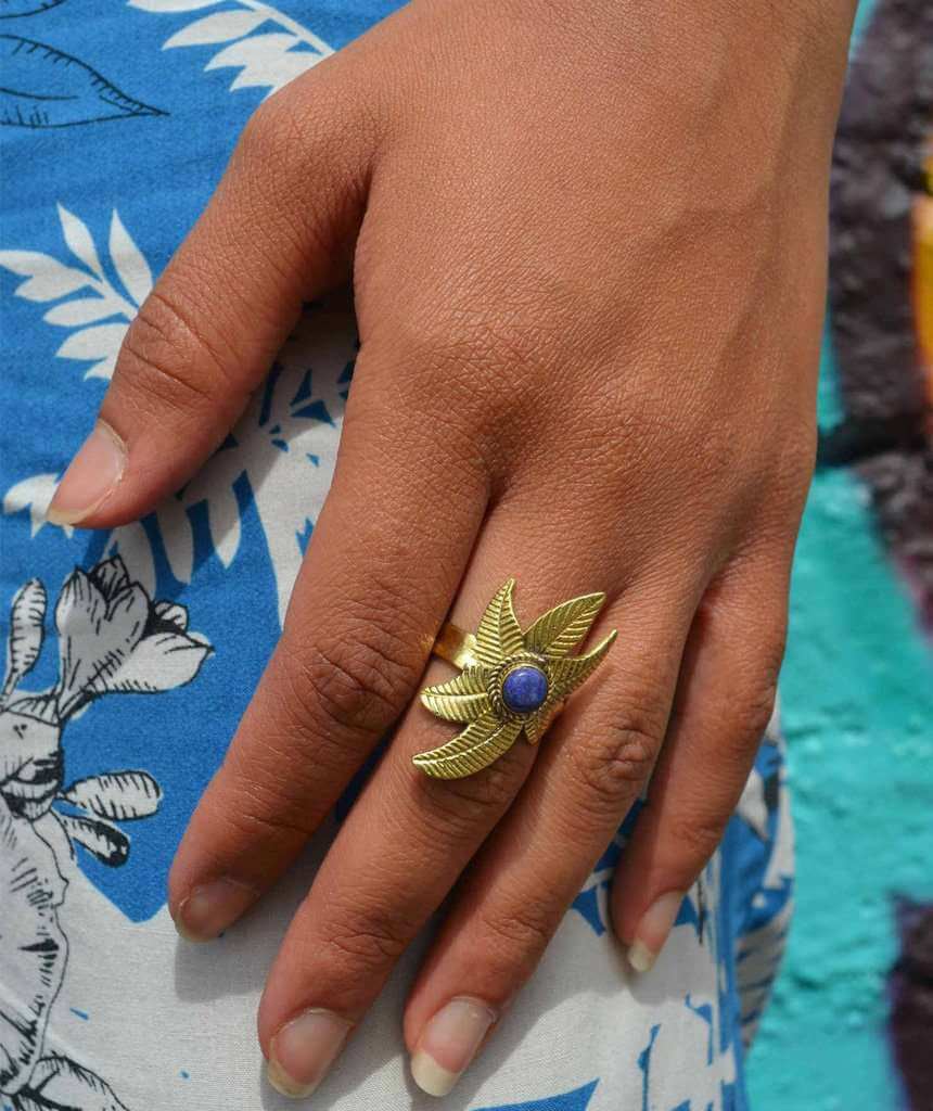 A beautiful Flower Ring featuring a unique floral design, crafted from hypoallergenic brass and silver, perfect for festivals and everyday wear.