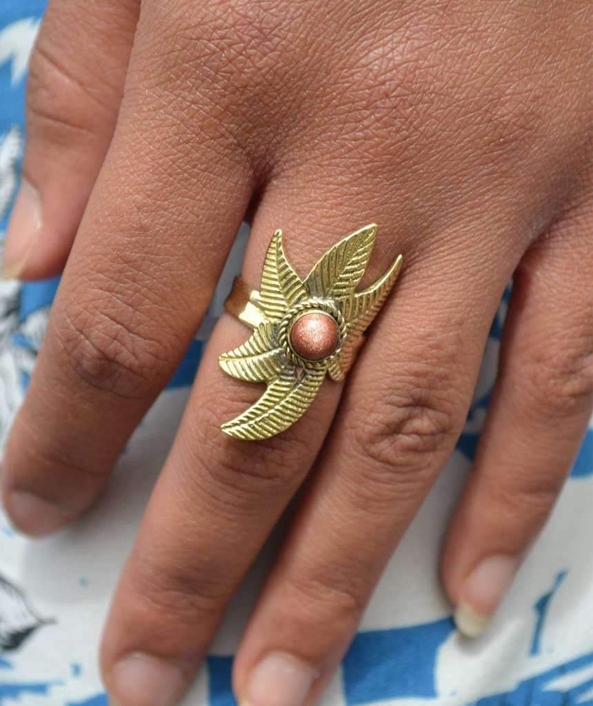 A beautiful Flower Ring featuring a unique floral design, crafted from hypoallergenic brass and silver, perfect for festivals and everyday wear.