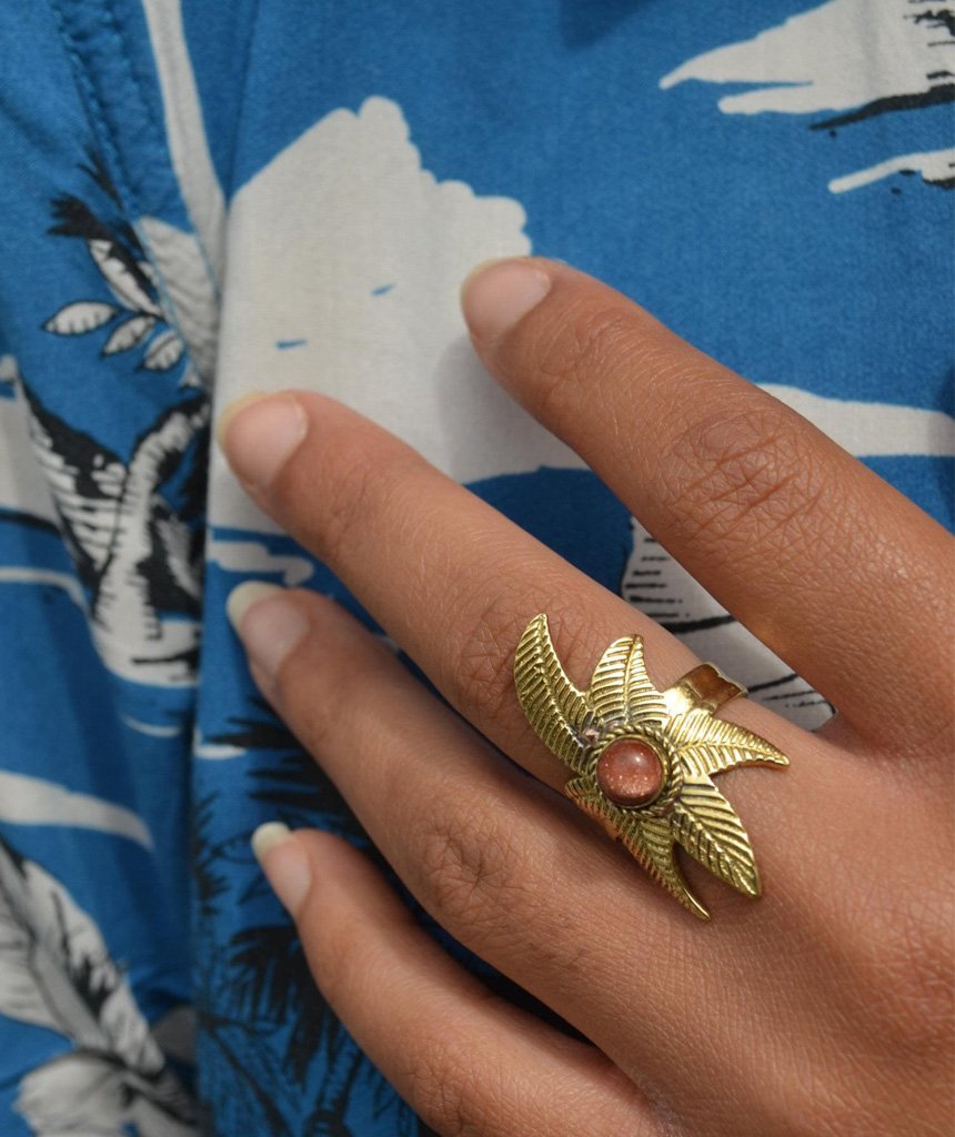 A beautiful Flower Ring featuring a unique floral design, crafted from hypoallergenic brass and silver, perfect for festivals and everyday wear.