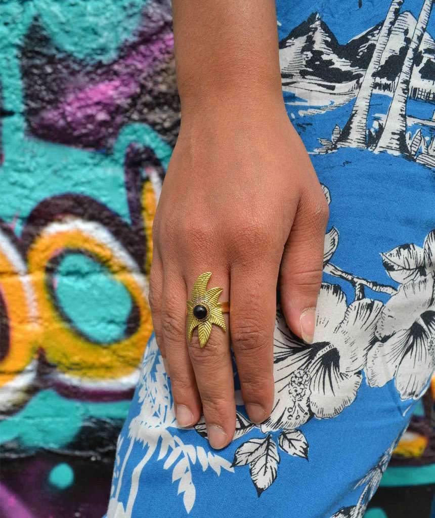 A beautiful Flower Ring featuring a unique floral design, crafted from hypoallergenic brass and silver, perfect for festivals and everyday wear.