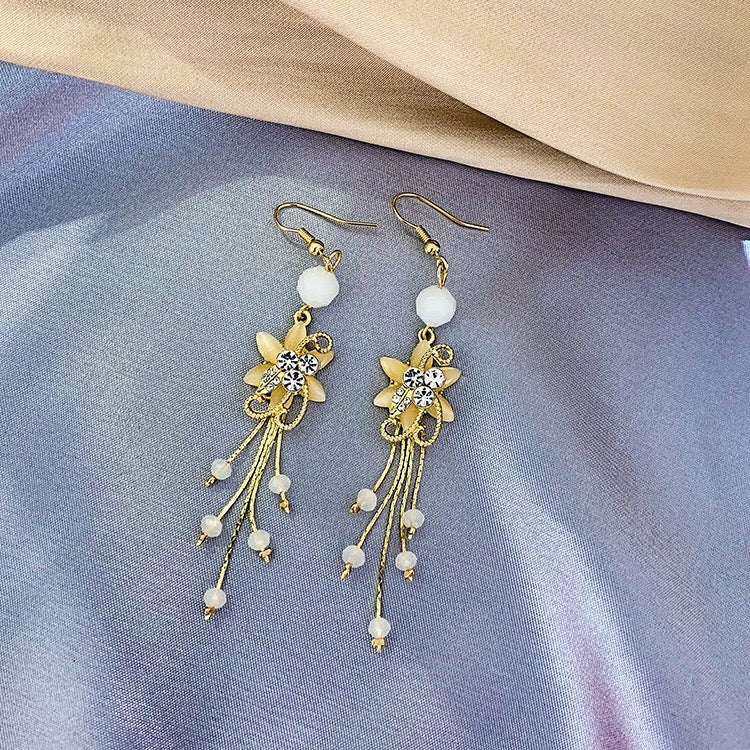 Elegant Flower Slinky Drop Beads Earrings made of alloy, rhinestone, and 925 silver, showcasing a beautiful floral design.