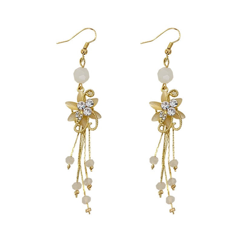 Elegant Flower Slinky Drop Beads Earrings made of alloy, rhinestone, and 925 silver, showcasing a beautiful floral design.