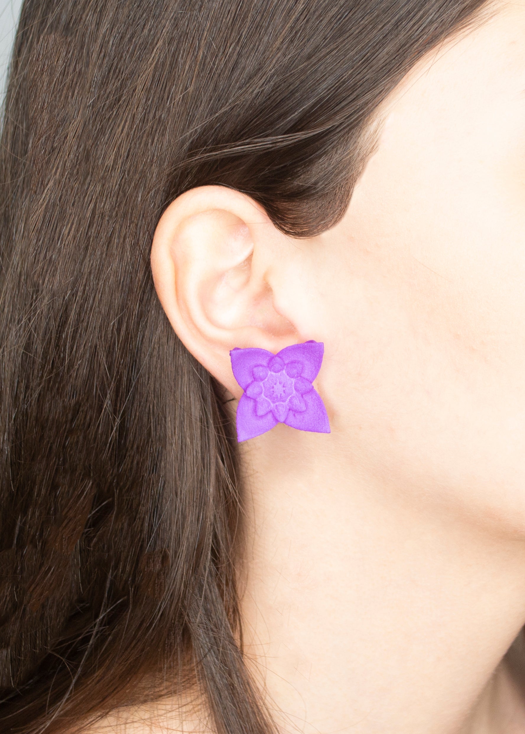 A pair of Dahlia Flower Stud Earrings featuring a floral design in vibrant colors, made from nylon and sterling silver.