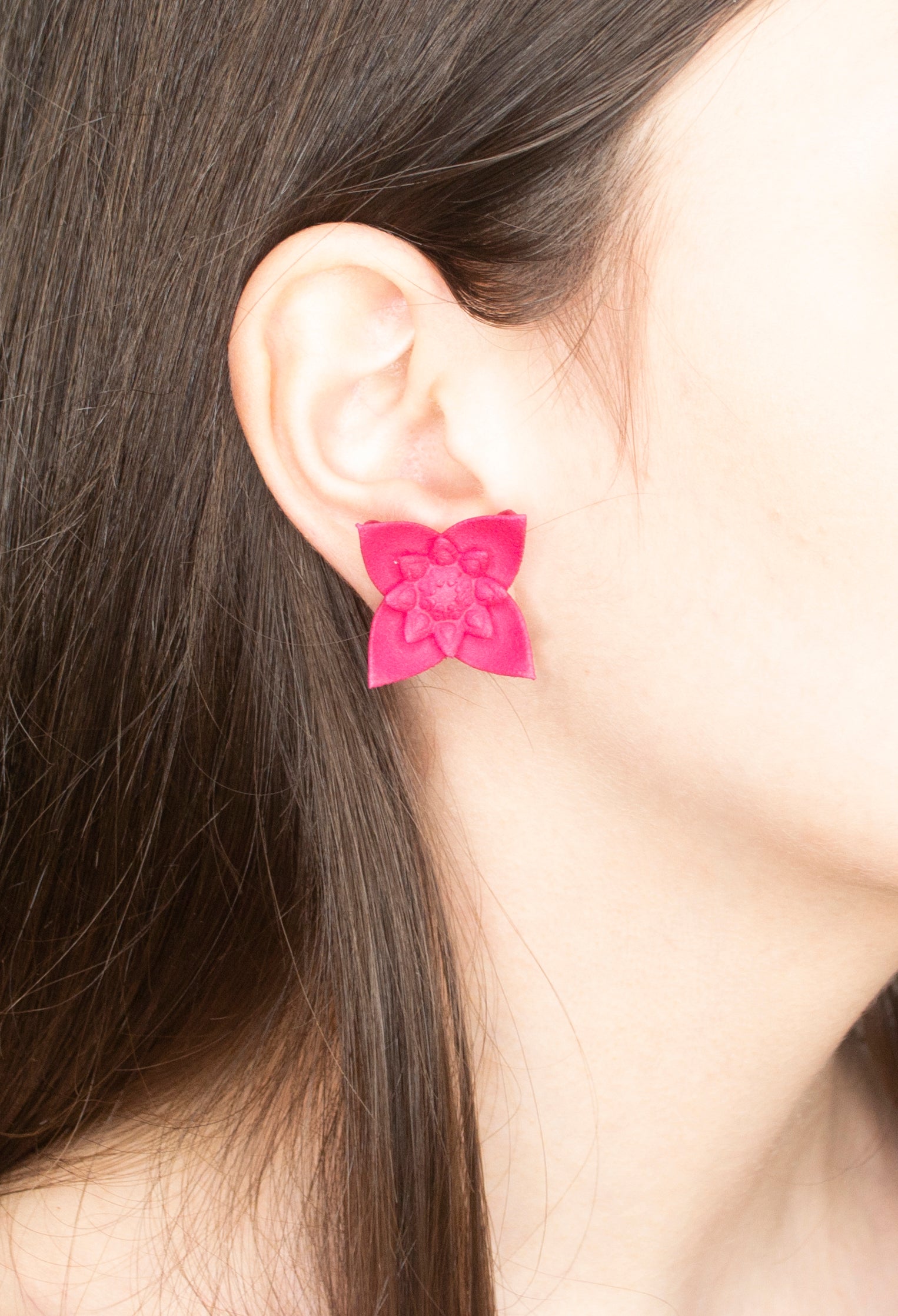 A pair of Dahlia Flower Stud Earrings featuring a floral design in vibrant colors, made from nylon and sterling silver.