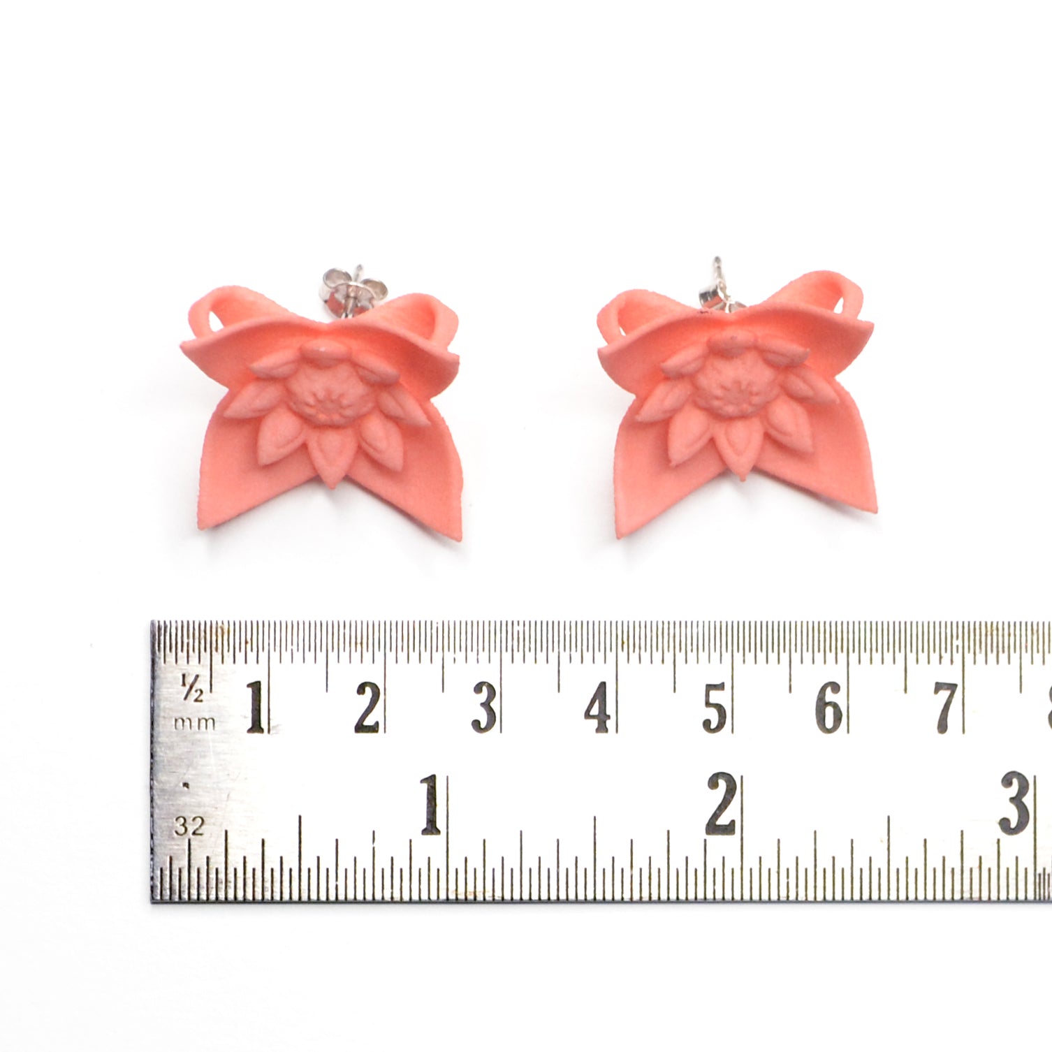 A pair of Dahlia Flower Stud Earrings featuring a floral design in vibrant colors, made from nylon and sterling silver.