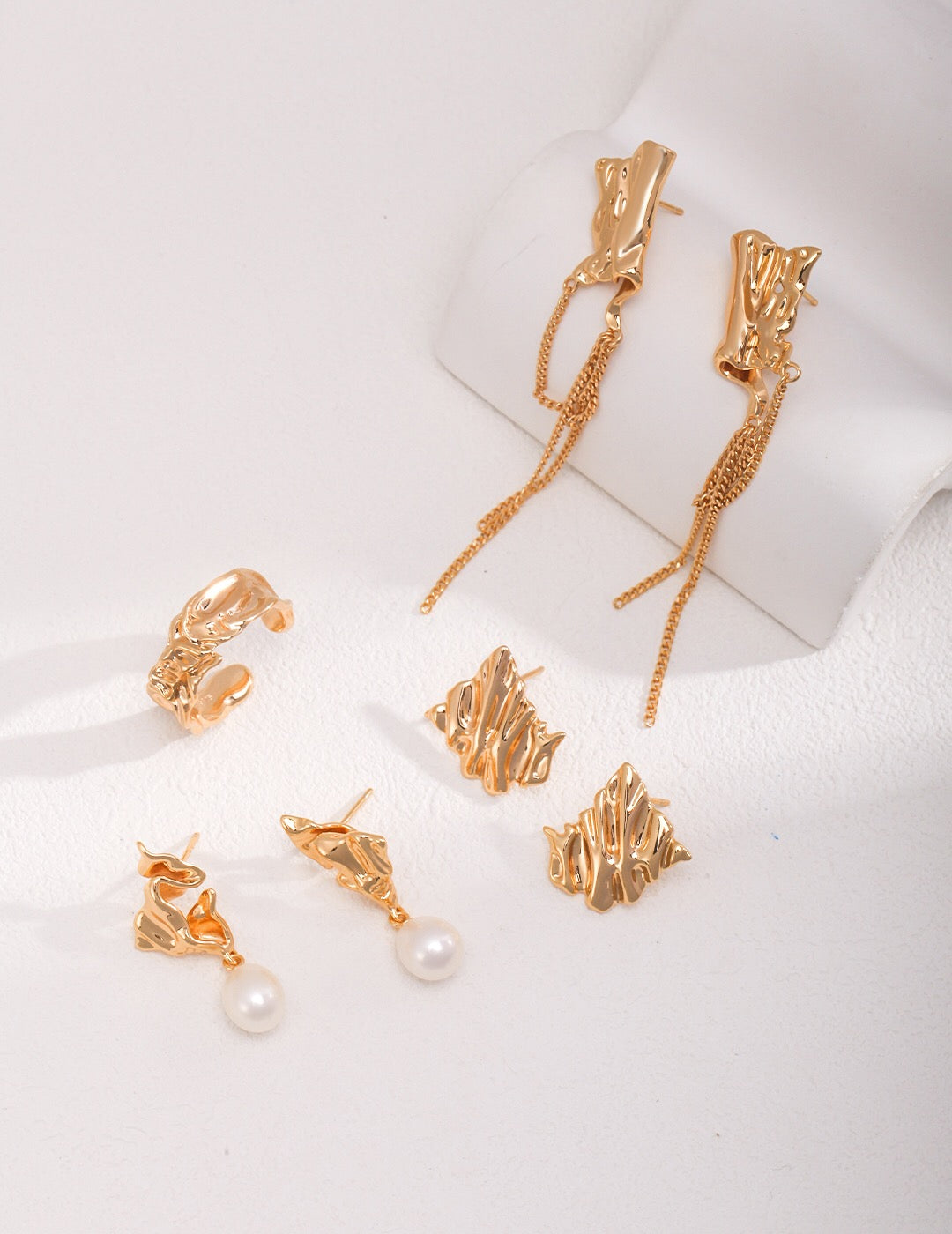 Fluid Elegance Pearl Earrings featuring natural pearls and gold vermeil, elegantly designed for a sophisticated look.