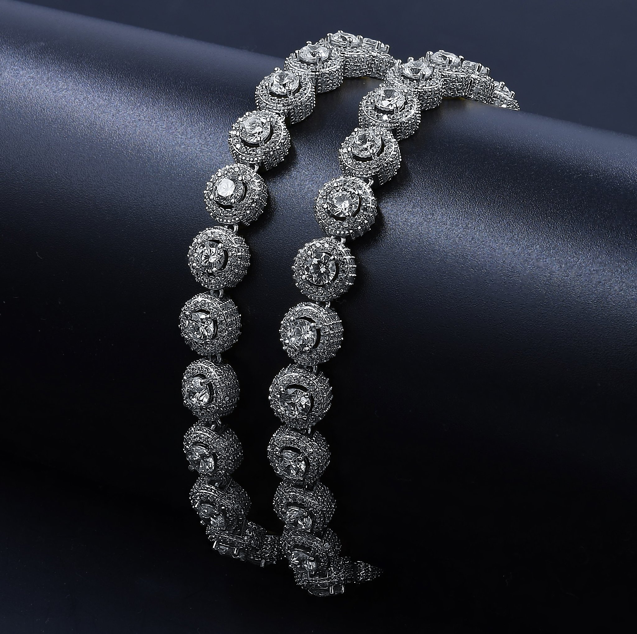 FLUORESCENT Square Tennis Chain featuring round zirconia on a brass frame, showcasing its elegant design and brilliant shine.