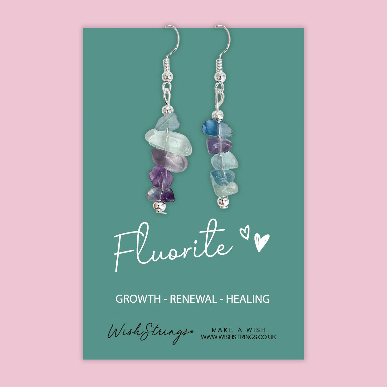 Fluorite gemstone chip dangle earrings on a gift card, showcasing vibrant colors and brass ear wires.