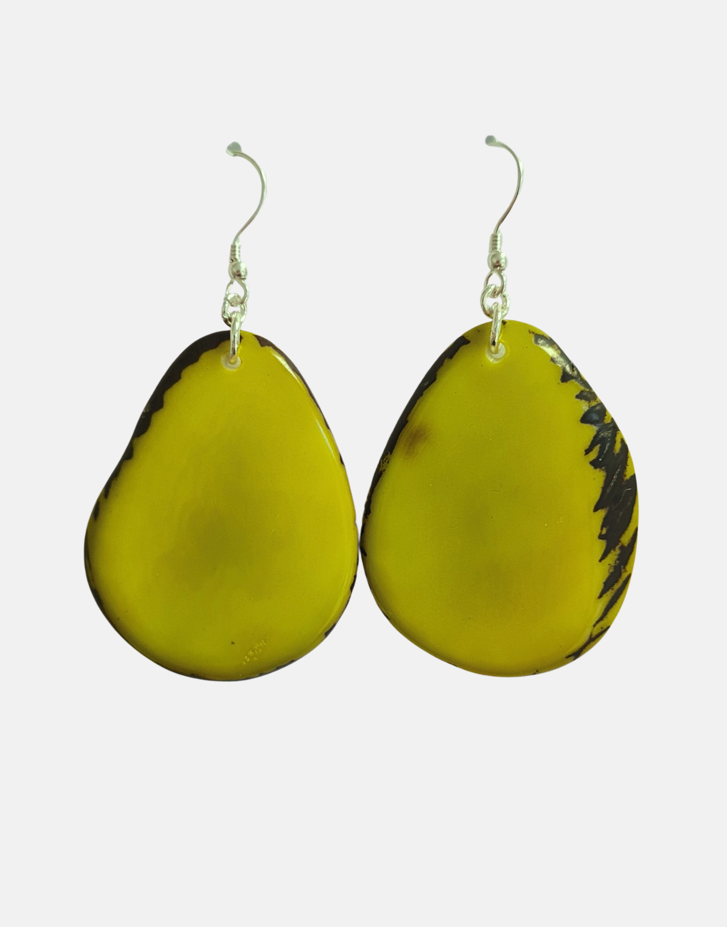 A pair of Folha Tagua Nut Earrings made from vegetable ivory with sterling silver hooks, showcasing unique natural textures and colors.