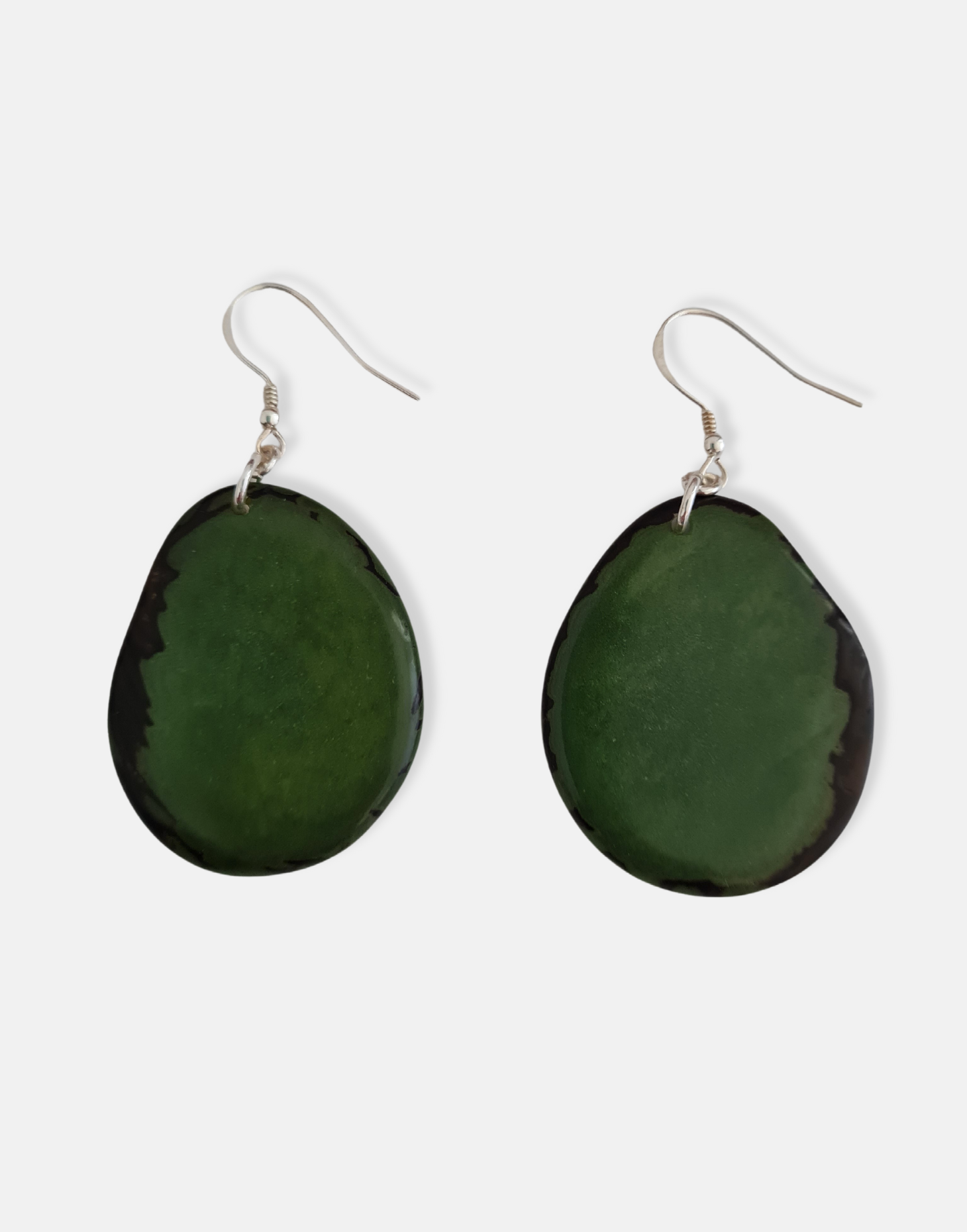 A pair of Folha Tagua Nut Earrings made from vegetable ivory with sterling silver hooks, showcasing unique natural textures and colors.