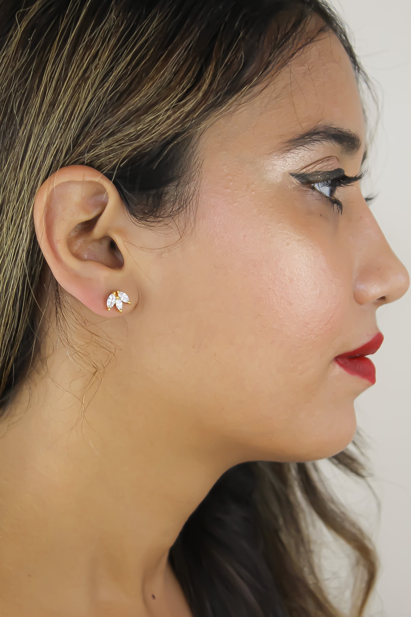 Elegant Fontana Earrings featuring 18K gold plating and three marquise-cut zirconia stones, perfect for sensitive ears.