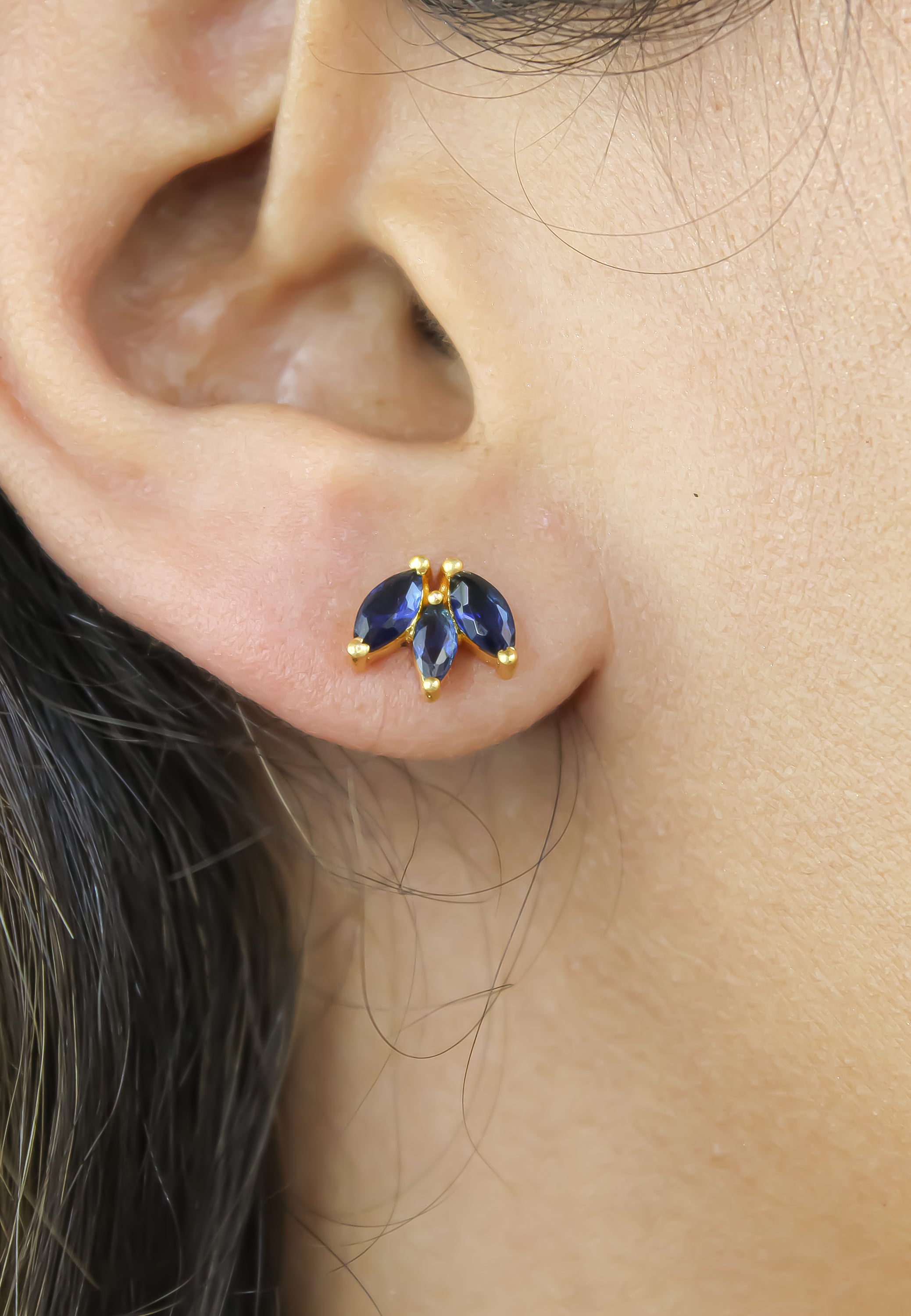 Elegant Fontana Earrings featuring 18K gold plating and three marquise-cut zirconia stones, perfect for sensitive ears.