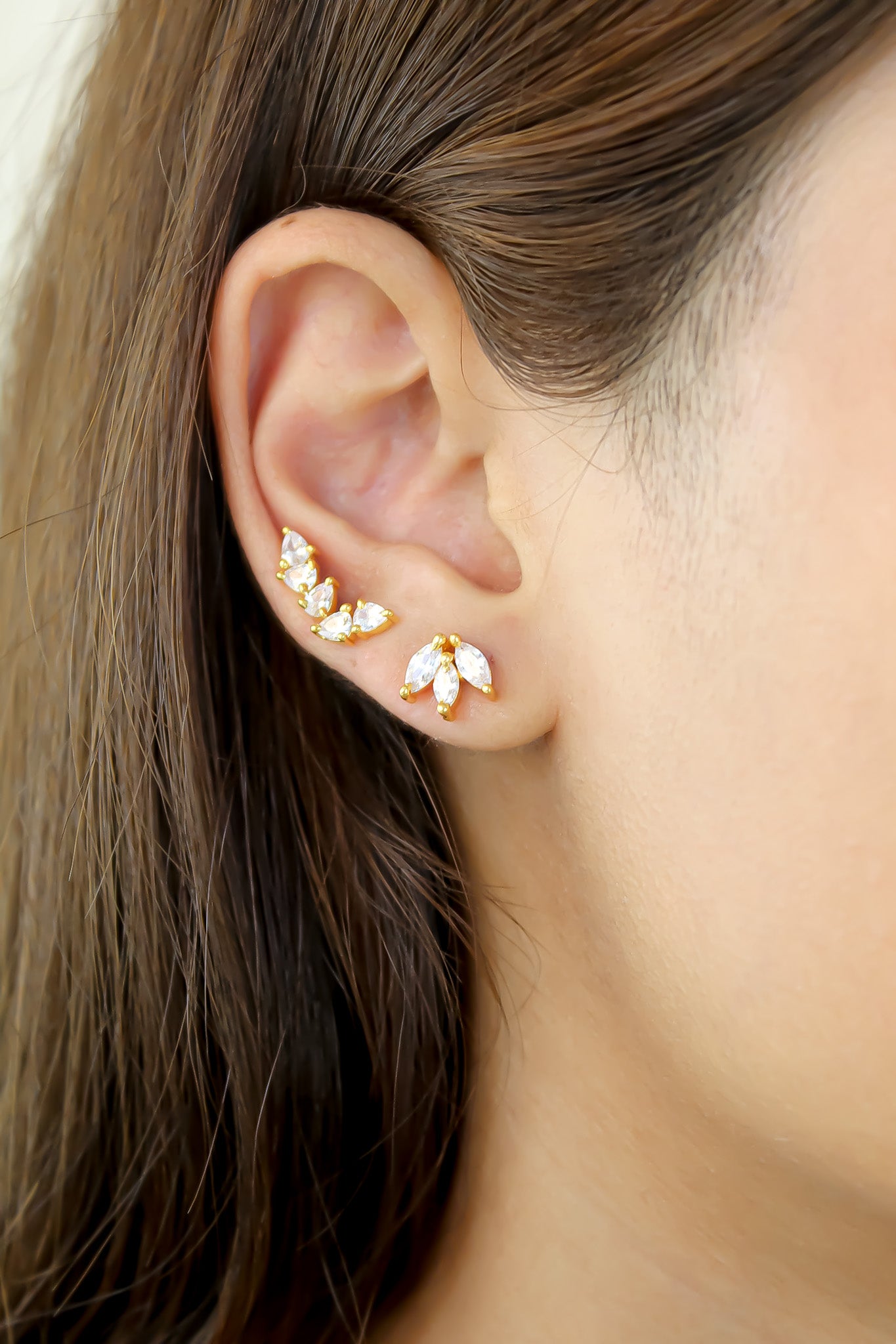 Elegant Fontana Earrings featuring 18K gold plating and three marquise-cut zirconia stones, perfect for sensitive ears.