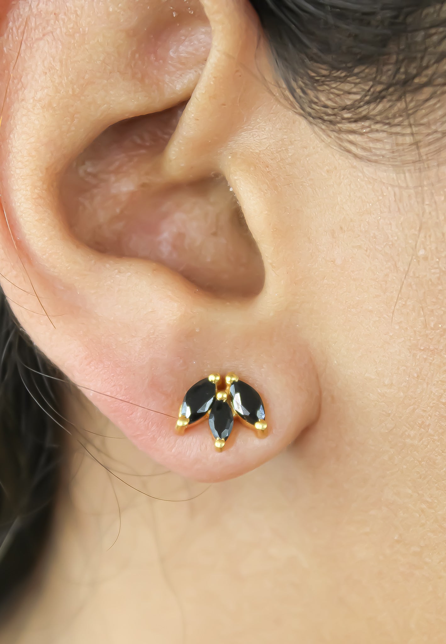 Elegant Fontana Earrings featuring 18K gold plating and three marquise-cut zirconia stones, perfect for sensitive ears.