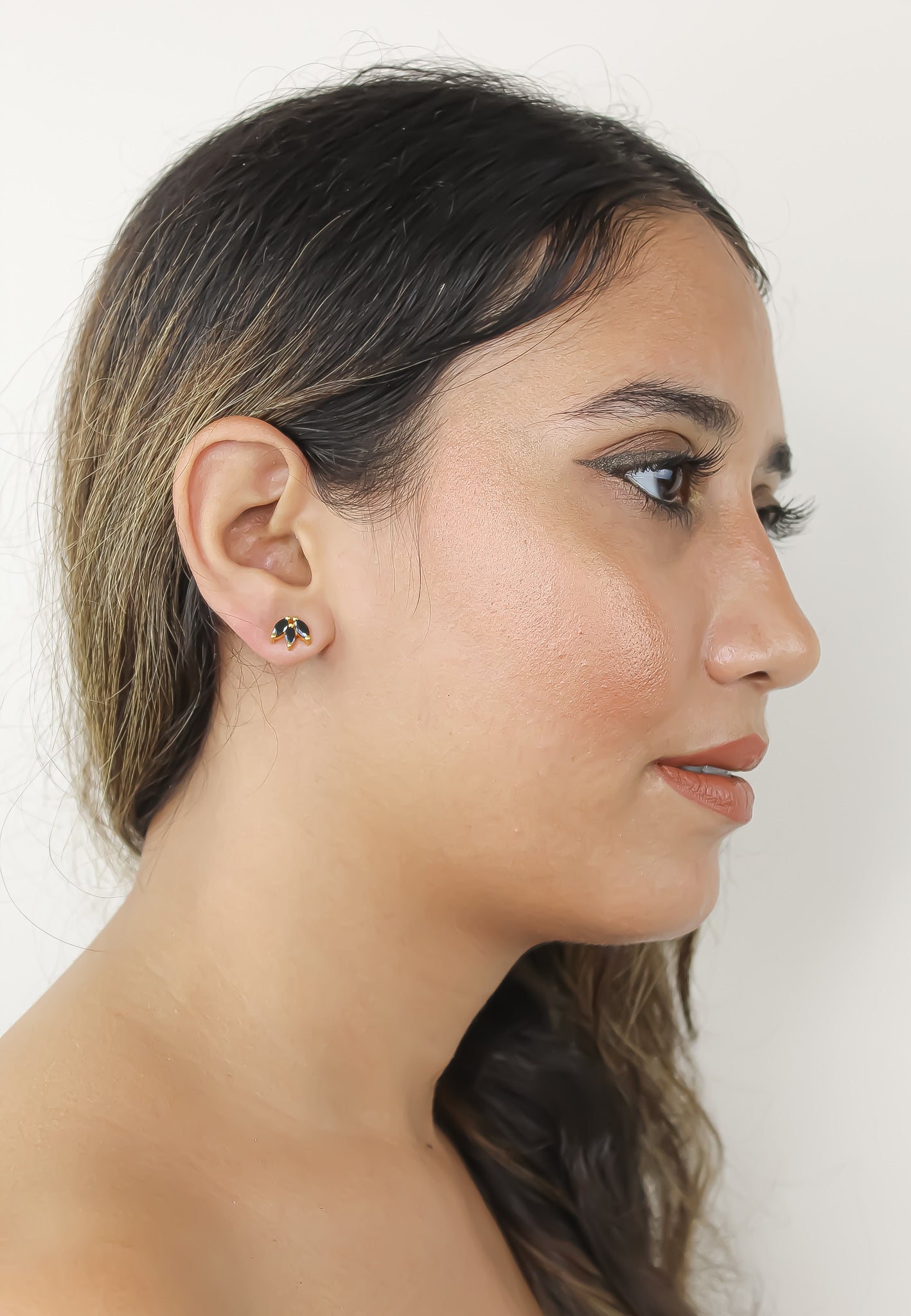 Elegant Fontana Earrings featuring 18K gold plating and three marquise-cut zirconia stones, perfect for sensitive ears.