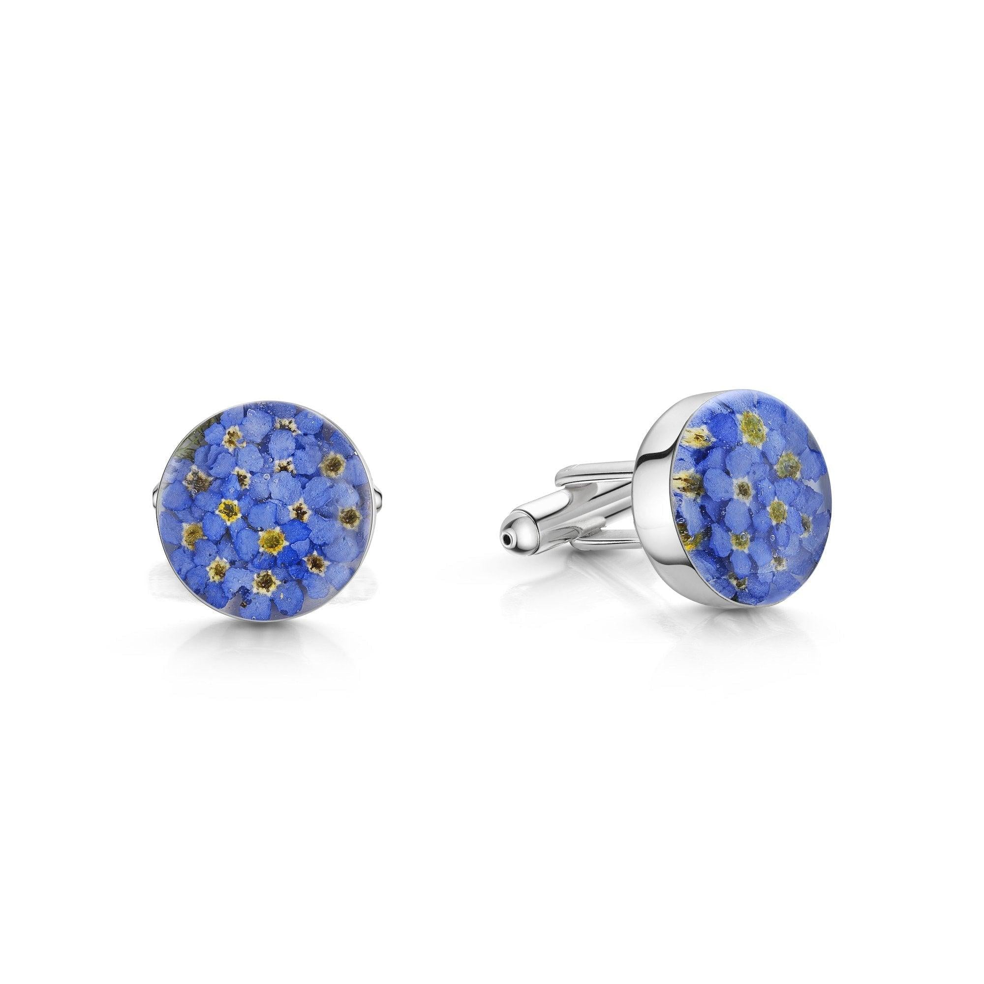 Elegant sterling silver cufflinks featuring real forget-me-not flowers, beautifully crafted and presented in a gift box.