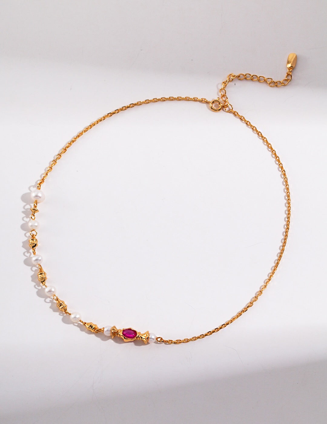 A beautiful Freshwater Pearl and Pink Zircon Necklace featuring natural pearls and pink zircon stones, elegantly plated with gold vermeil.