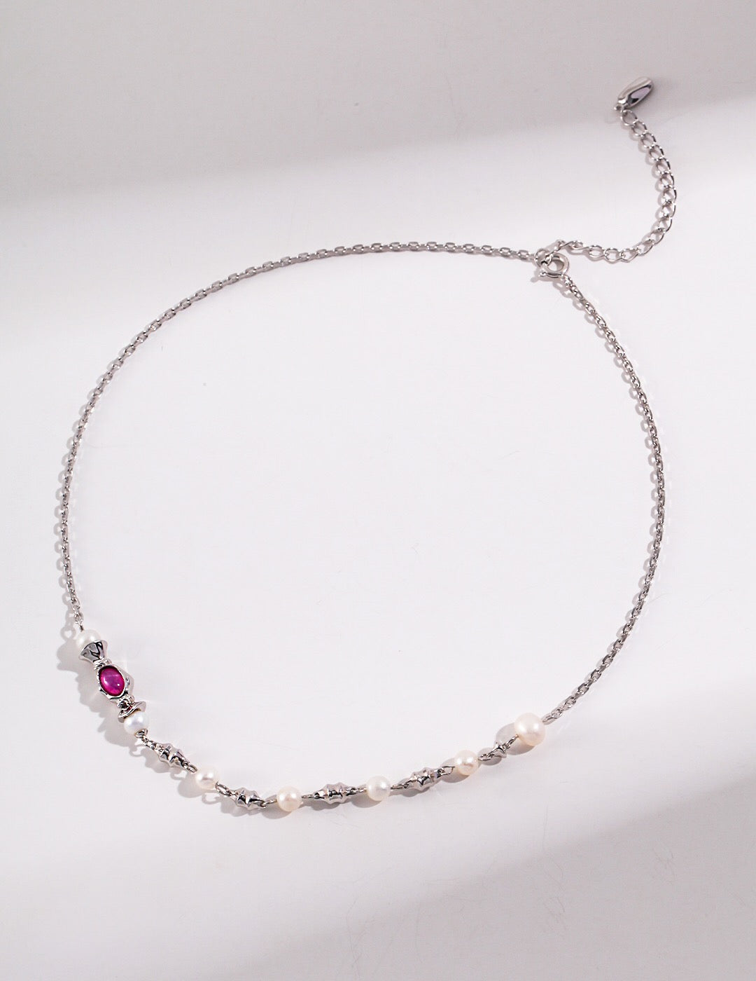 A beautiful Freshwater Pearl and Pink Zircon Necklace featuring natural pearls and pink zircon stones, elegantly plated with gold vermeil.