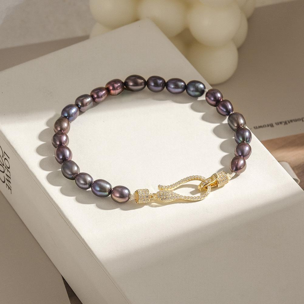 A stunning Freshwater Pearl Bracelet made from real pearls and hypo-allergenic sterling silver, elegantly displayed on a soft background.