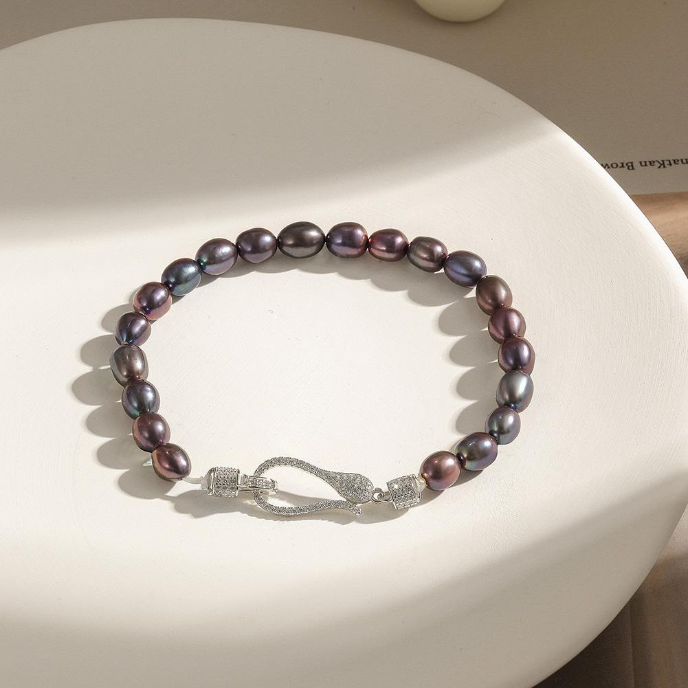 A stunning Freshwater Pearl Bracelet made from real pearls and hypo-allergenic sterling silver, elegantly displayed on a soft background.