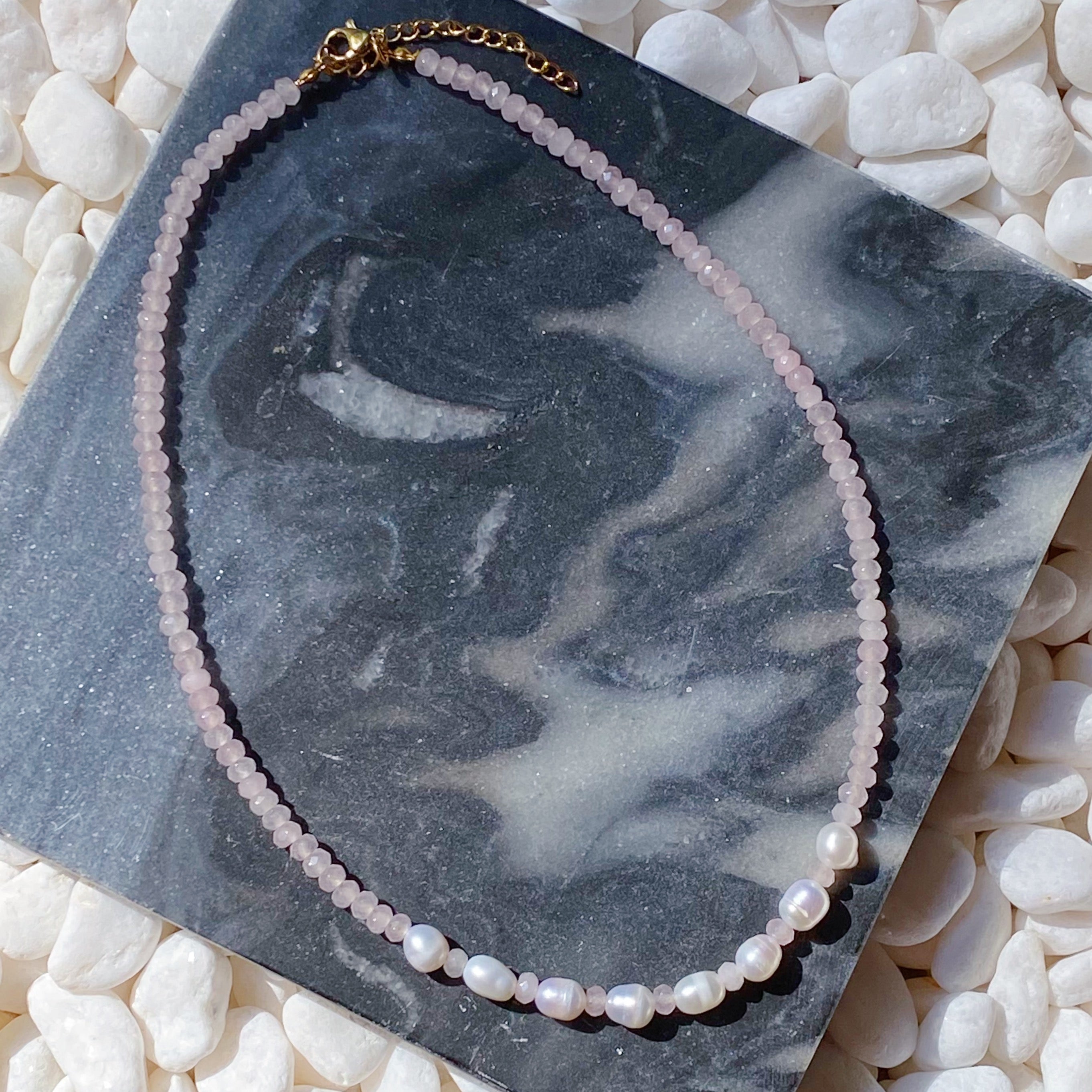 A stylish Freshwater Pearl Choker Necklace featuring natural stone beads and a gold plated clasp, perfect for layering or wearing alone.