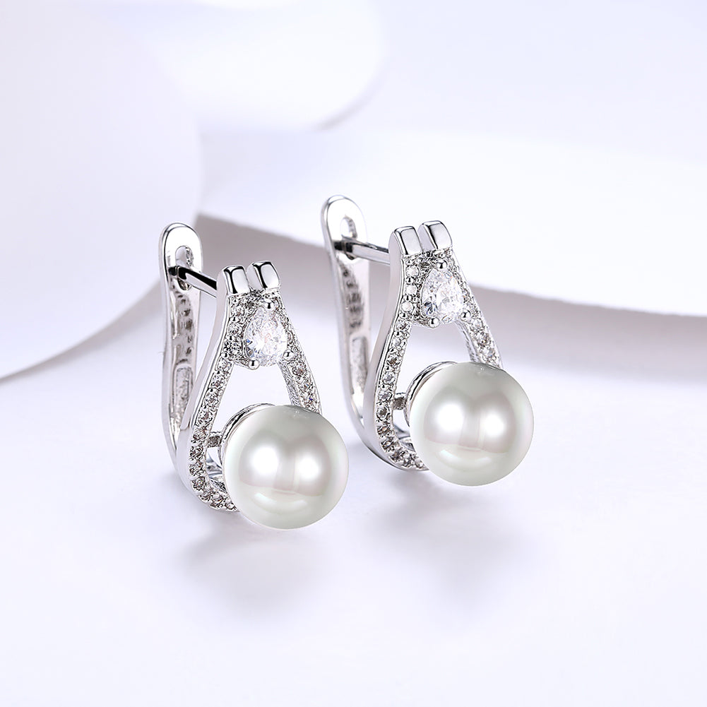 Elegant freshwater pearl leverback earrings in 18K white gold plating, showcasing their luxurious design and hypoallergenic features.