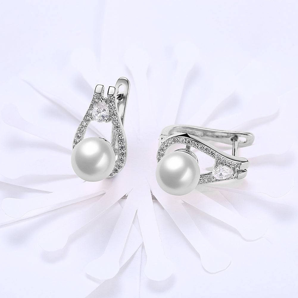 Elegant freshwater pearl leverback earrings in 18K white gold plating, showcasing their luxurious design and hypoallergenic features.