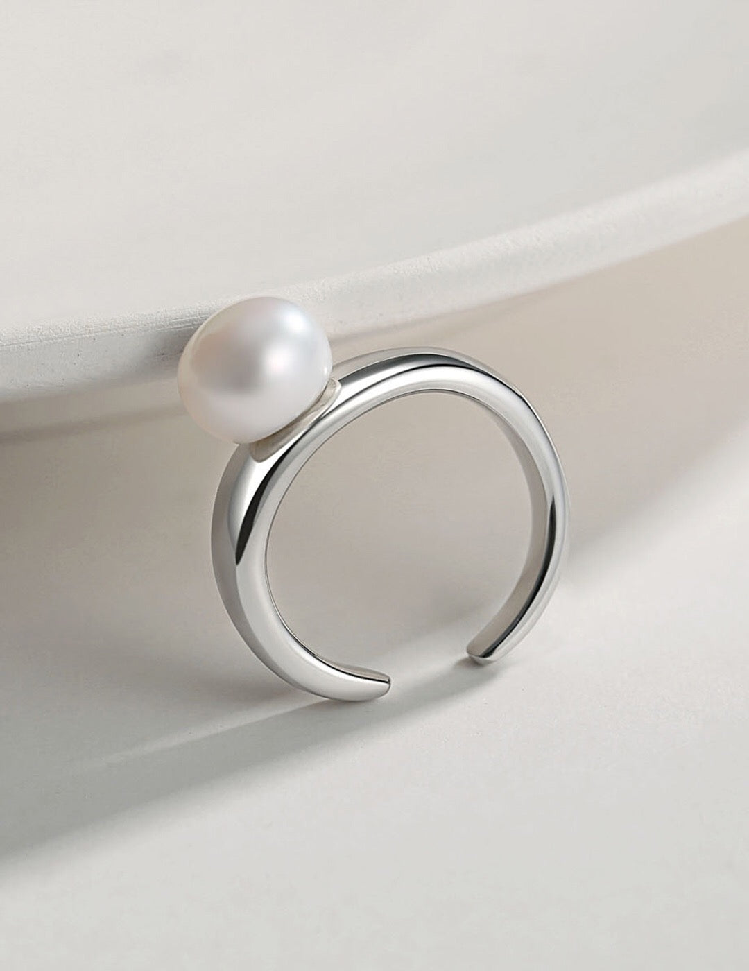 A stunning Freshwater Pearl Open Tail Ring featuring a natural pearl set in a gold vermeil band, showcasing its elegant open tail design.