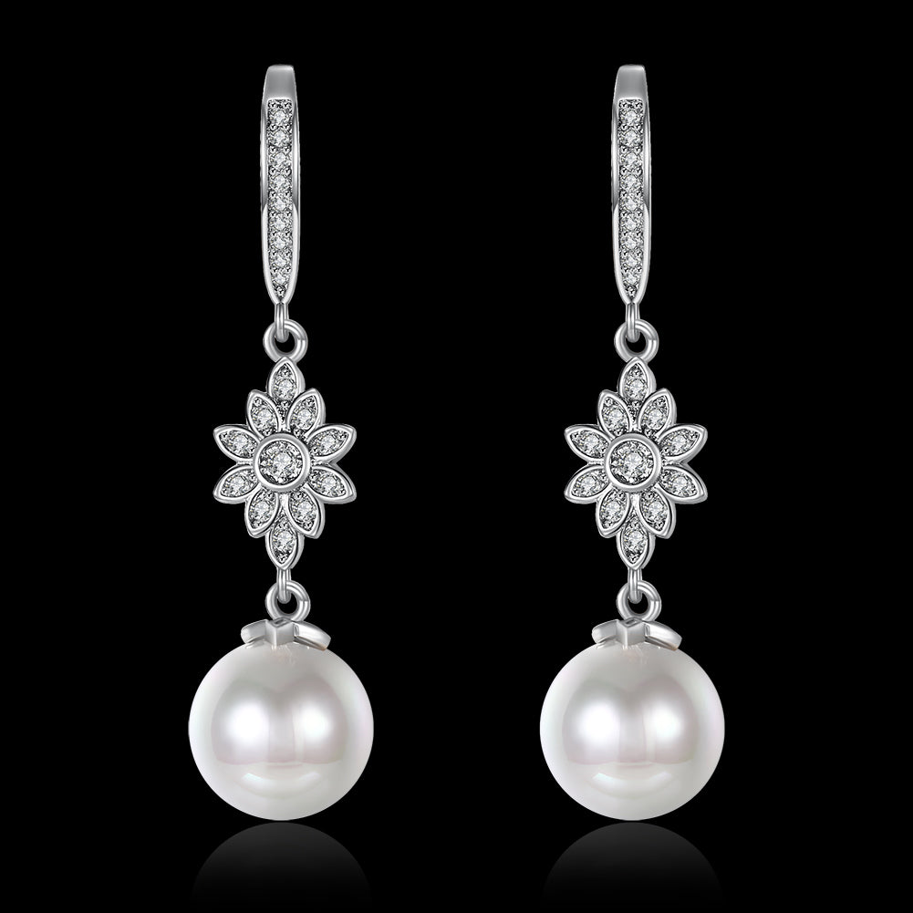 Elegant Freshwater Pearl Starburst Drop Earrings in 18K white gold plating, showcasing a stunning design with hypoallergenic features.