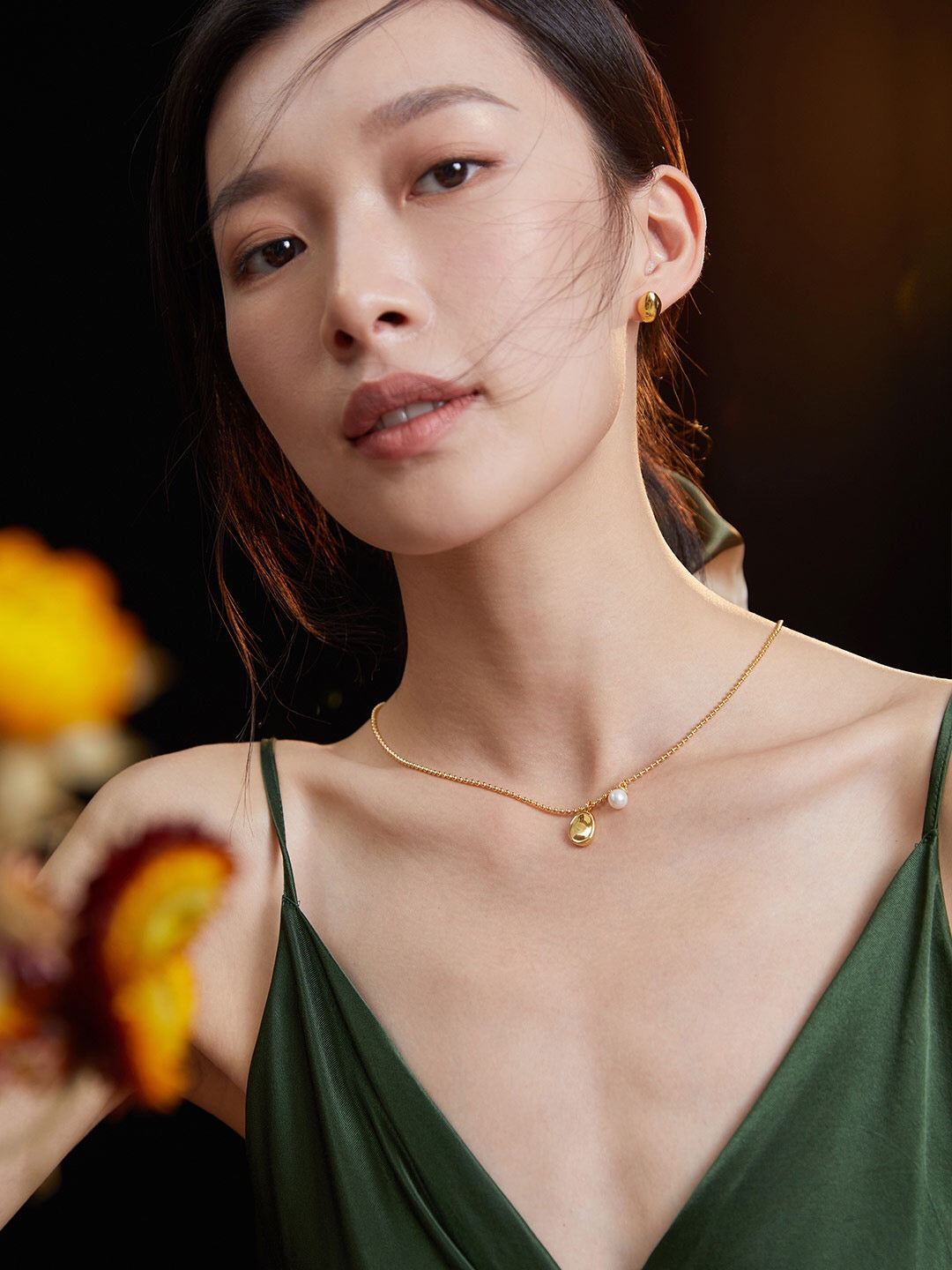 A delicate Freshwater Pearl with Bean Pendant Necklace featuring a natural pearl and gold vermeil chain, elegantly displayed.