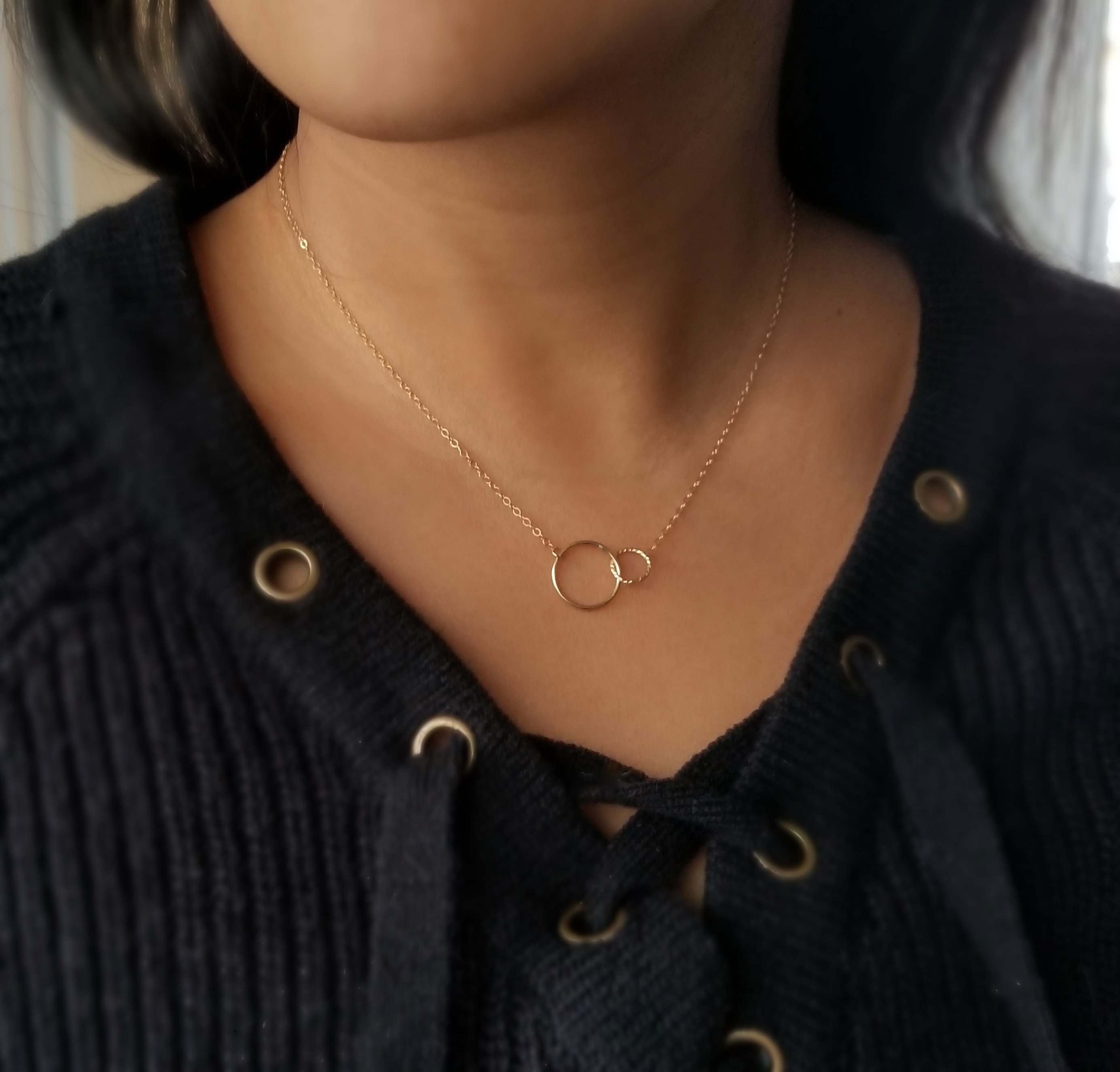 Friendship Necklace featuring two unique circle pendants linked together, crafted from natural shell with a gold-filled or sterling silver chain.