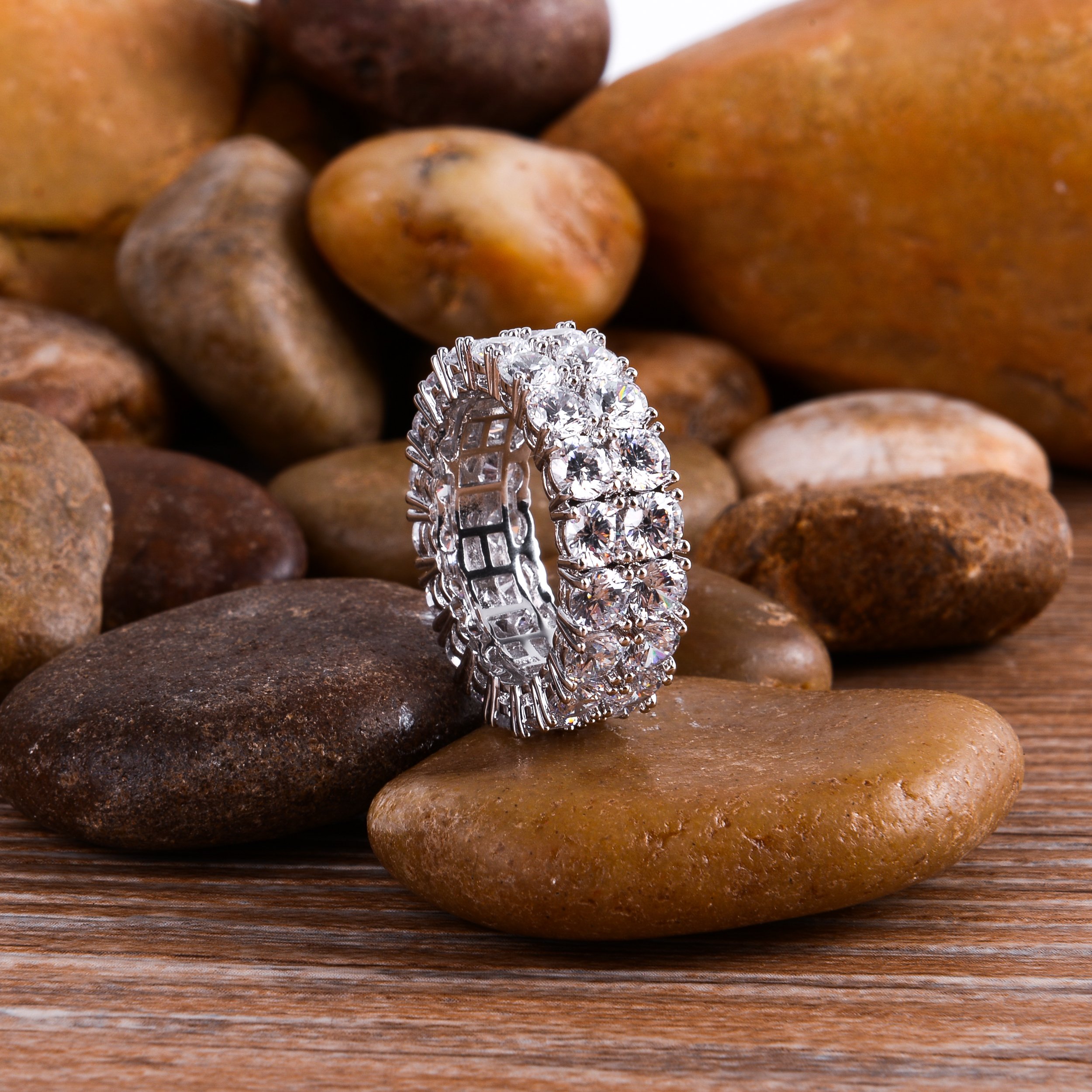 A stunning FRINGE 925 Silver Ring featuring a round shape with micro-pave CZ stones, showcasing its elegant design and high-quality craftsmanship.