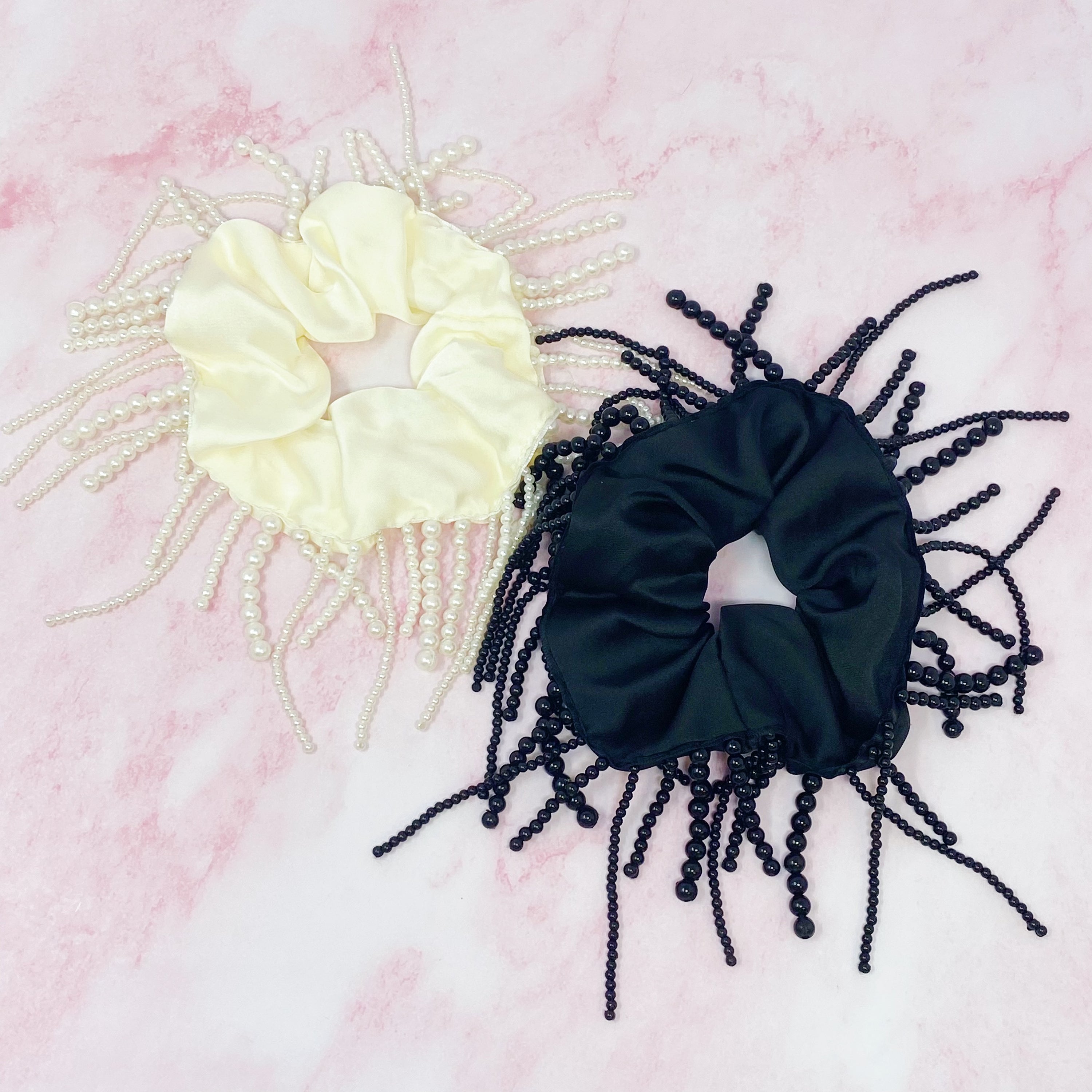 Fringed By Hand Hair Scrunch featuring pearl and bead details in elegant satin material.