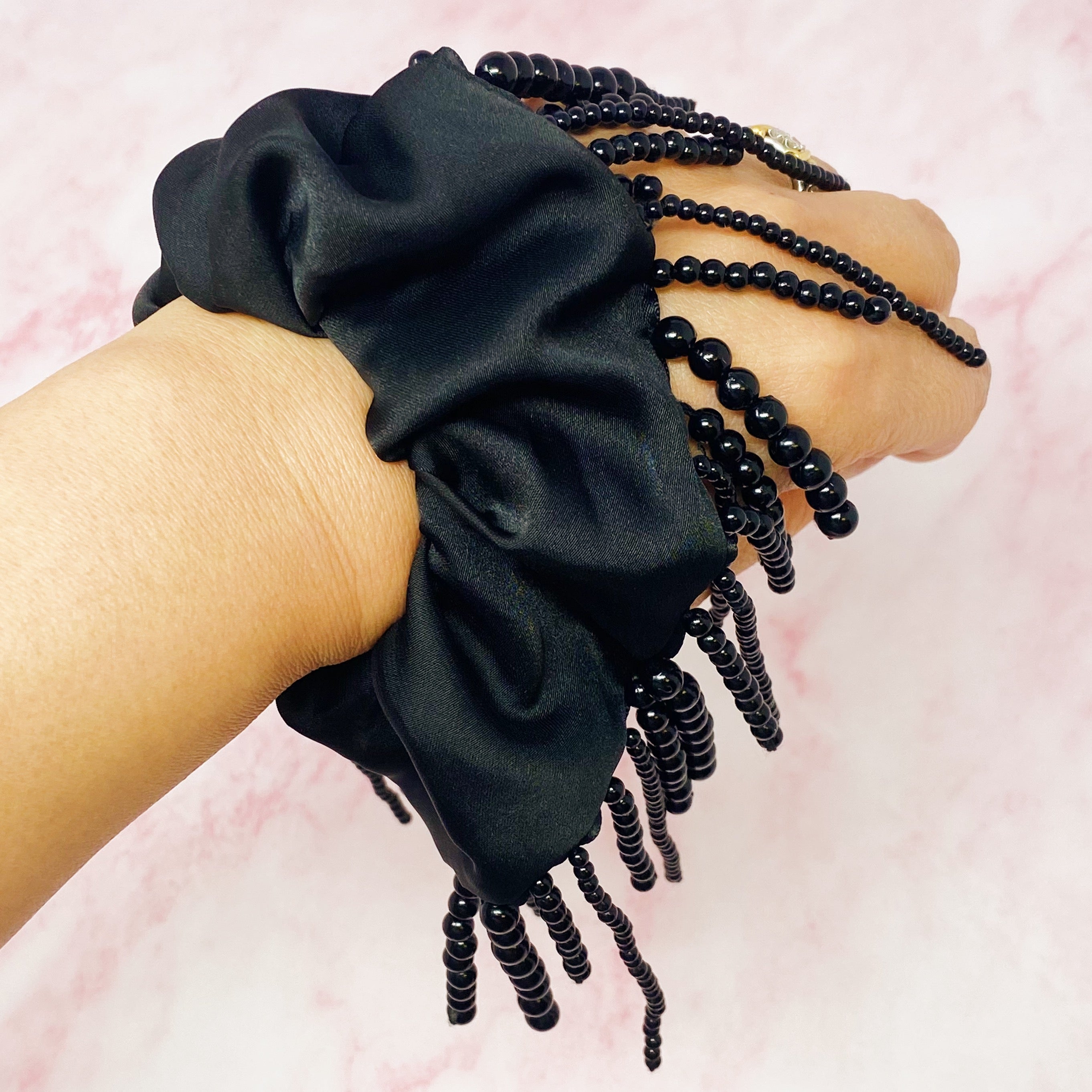 Fringed By Hand Hair Scrunch featuring pearl and bead details in elegant satin material.