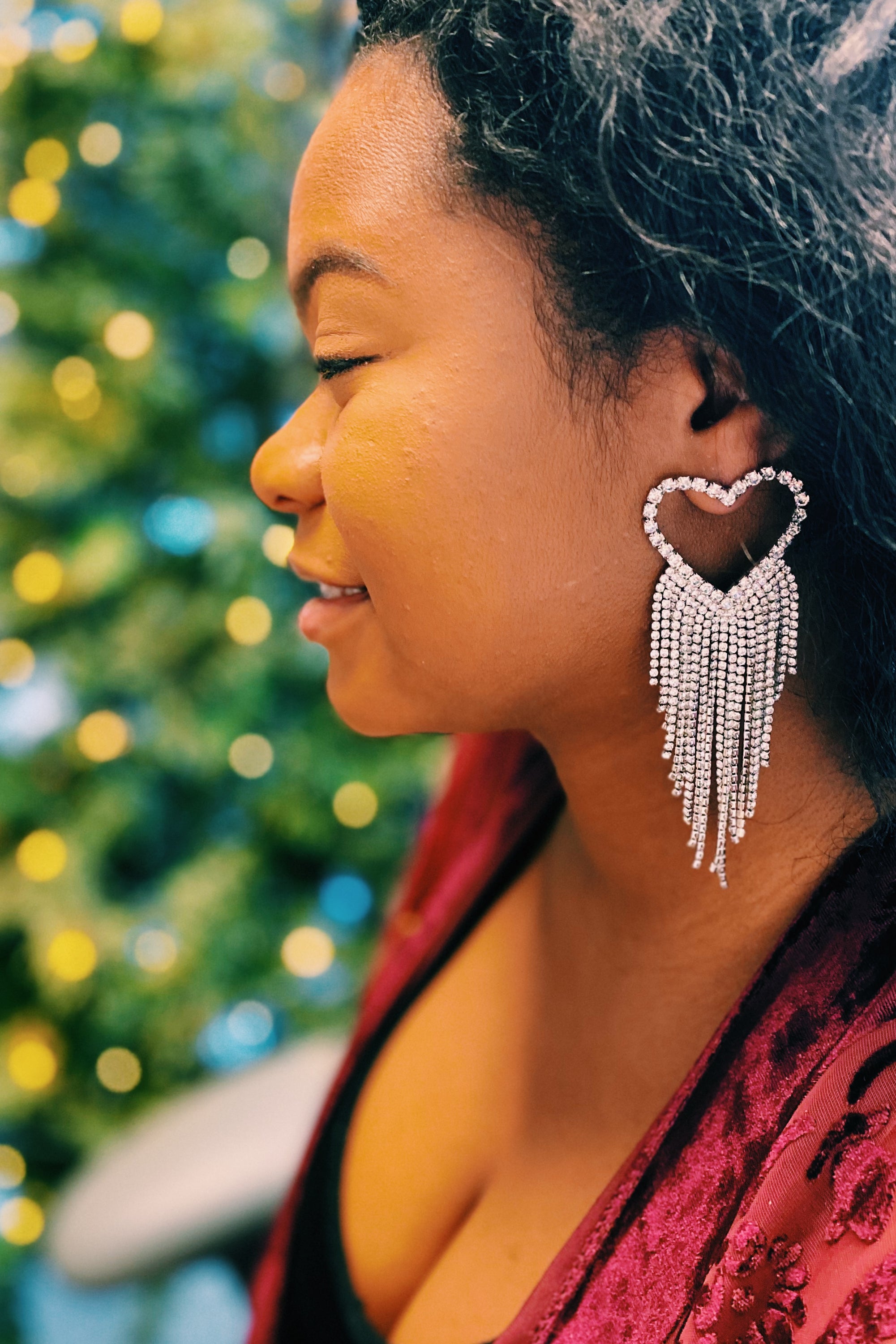 Fringed Shine Heart Earrings with cascading shiny fringes and glass diamond bead accents, showcasing a stylish heart design.