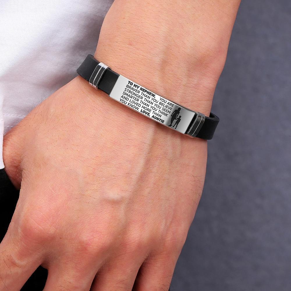 Auntie to Nephew engraved steel and silicone bracelet in silver and gold colors, showcasing a heartfelt message.