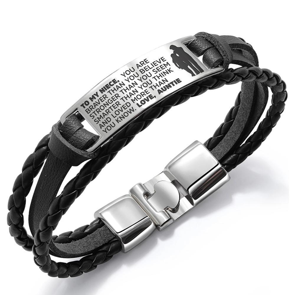 A stylish steel and leather bracelet engraved with a heartfelt message for a niece, featuring a high-strength clasp and elegant design.