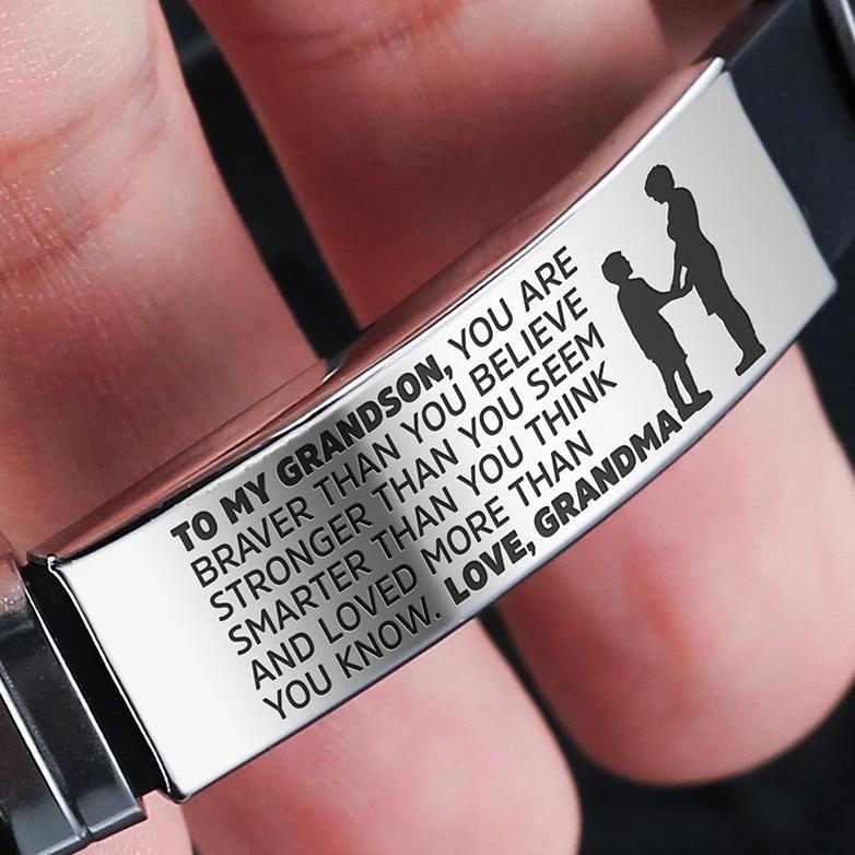 A stylish steel and silicone bracelet engraved with a heartfelt message from Grandma to Grandson, showcasing its premium quality and design.