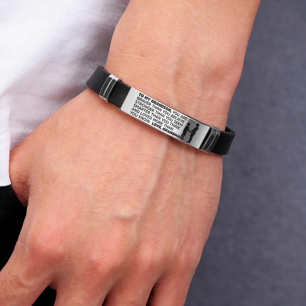 A stylish steel and silicone bracelet engraved with a heartfelt message from Grandma to Grandson, showcasing its premium quality and design.