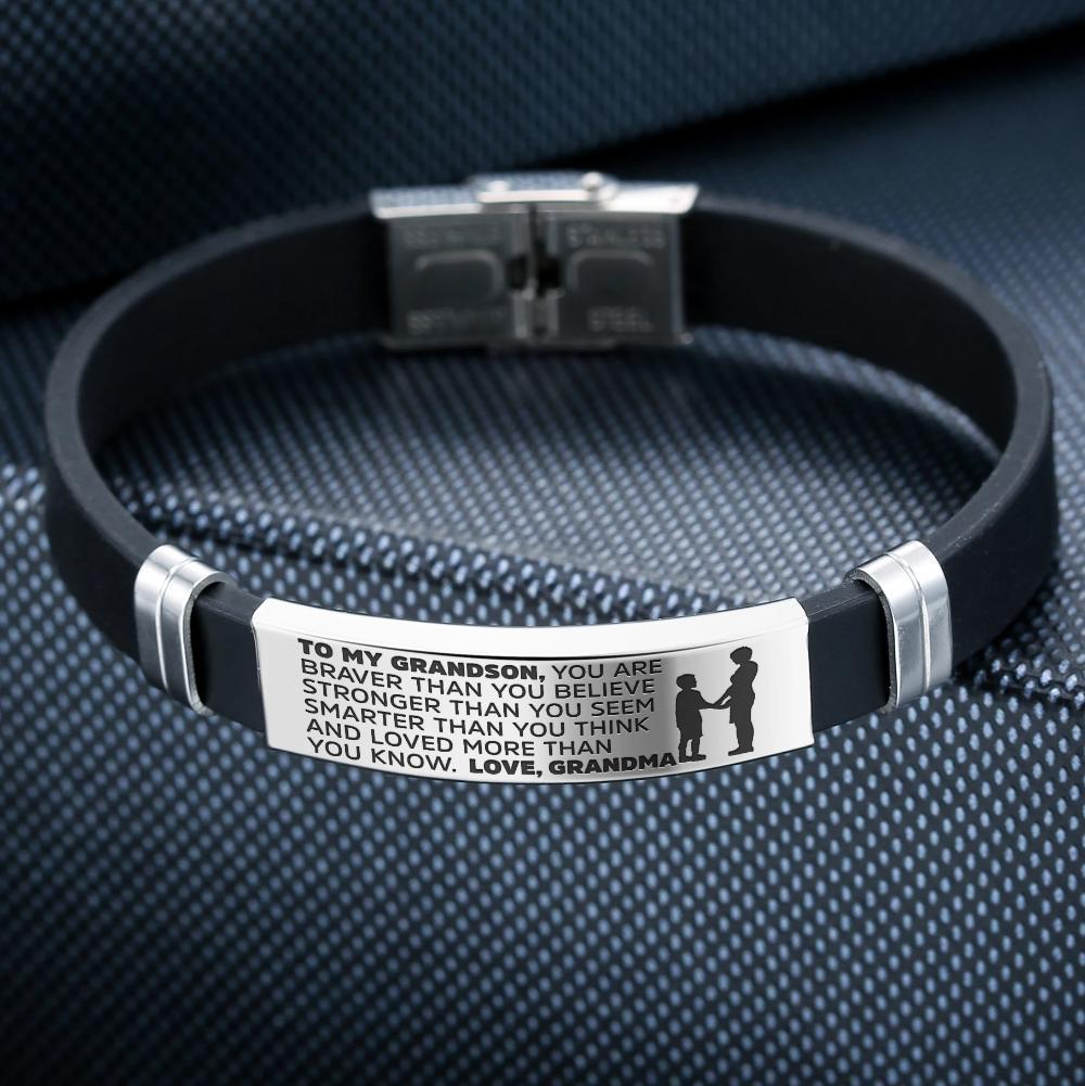 A stylish steel and silicone bracelet engraved with a heartfelt message from Grandma to Grandson, showcasing its premium quality and design.