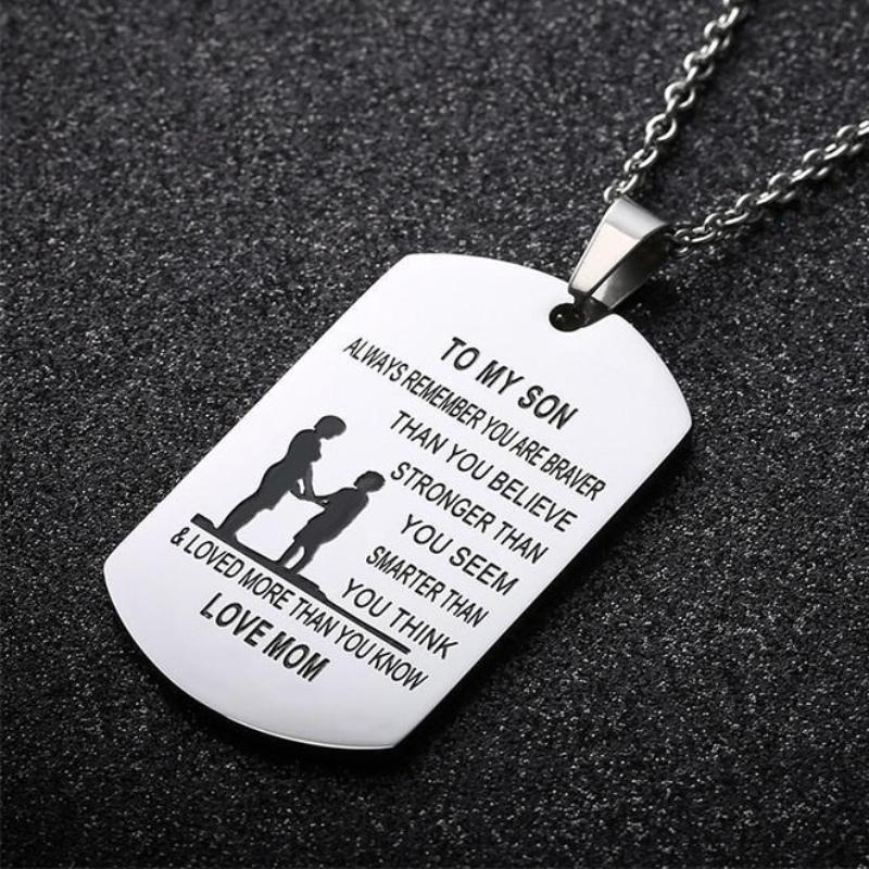 From Mom to Son Stainless Steel Dog Tag Necklace with deep engraved design and black enamel inlay on a sturdy chain.